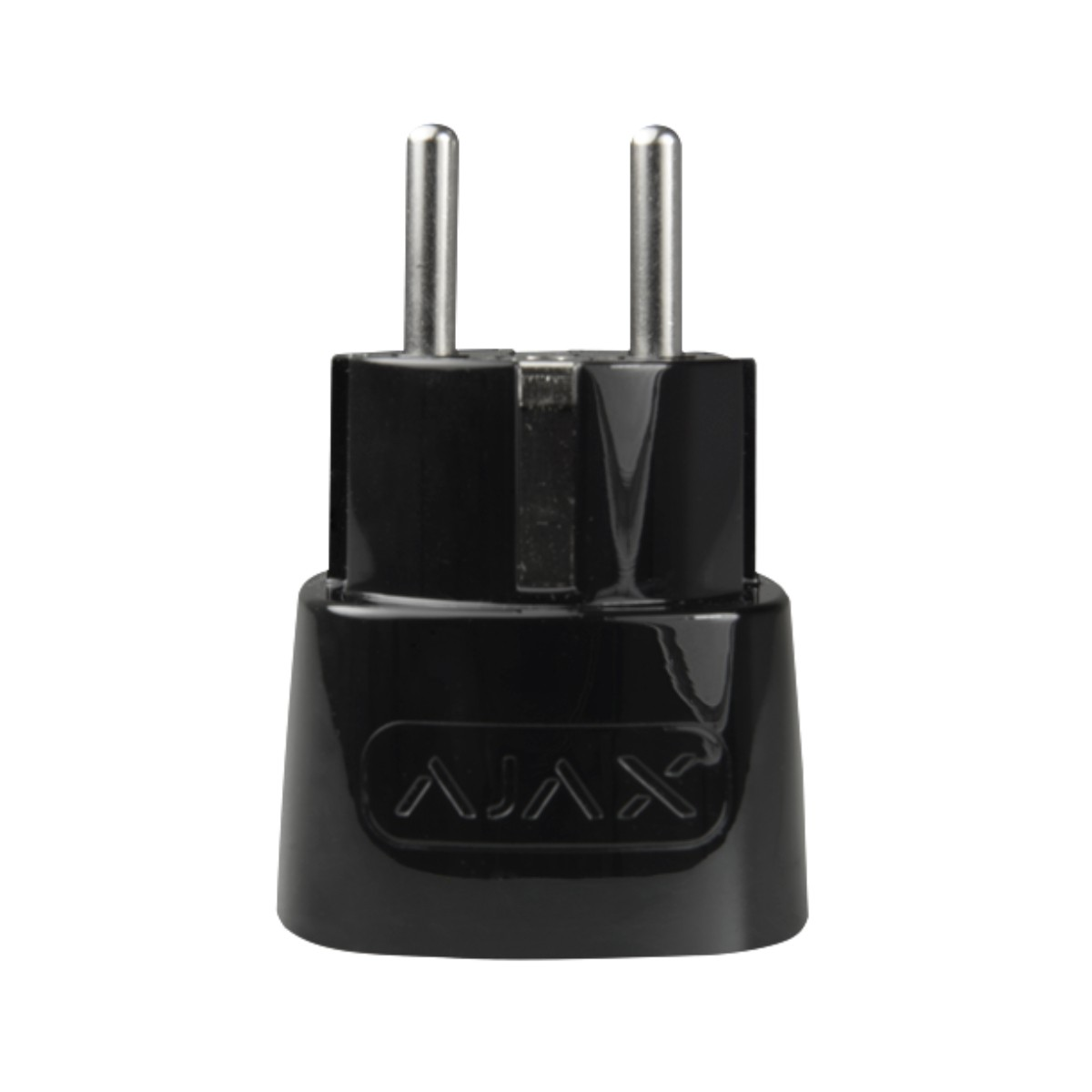 Un adaptador de enchufe negro con dos clavijas plateadas. El adaptador tiene la palabra 'AJAX' en la parte delantera. El fondo es blanco.