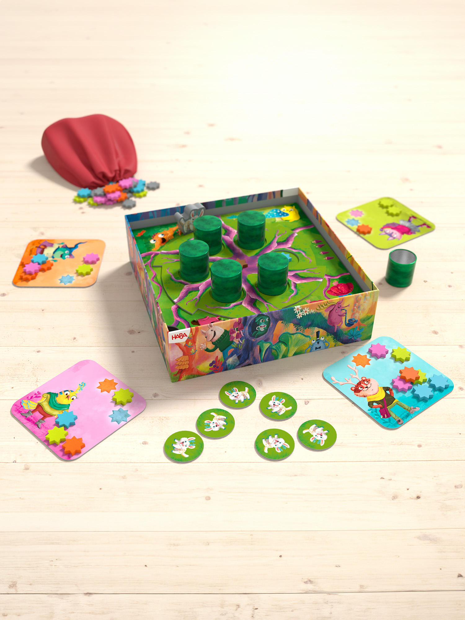 Un gioco da tavolo con carte, gettoni e un sacchetto su una superficie di legno. Il tabellone ha strutture ad albero e personaggi dei cartoni animati.