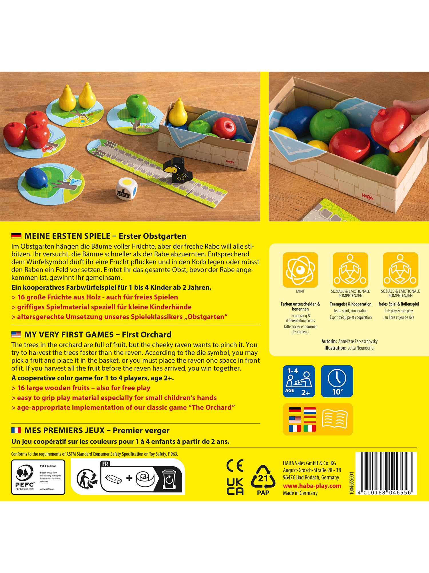 Ein Brettspiel mit Holzfrüchten, einem Würfel und einer Krähe auf einem Pfad. Die Box hat verschiedenfarbige Früchte.