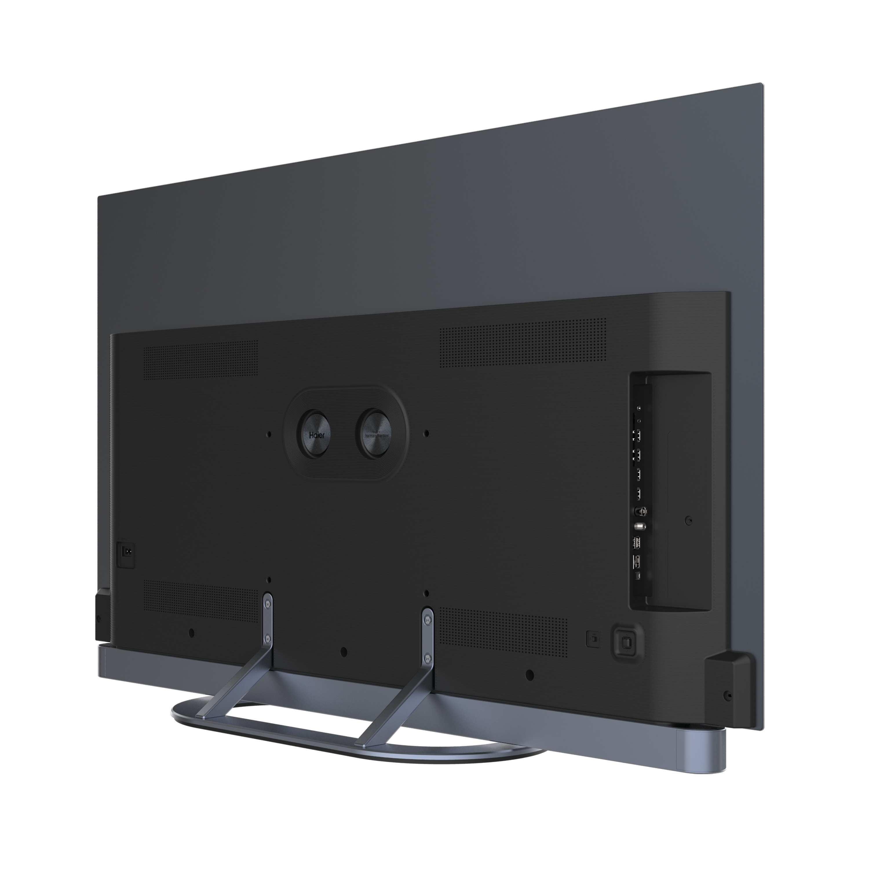 Il retro di una TV grigio scuro è mostrato, con porte e supporto. La TV è angolata verso destra.