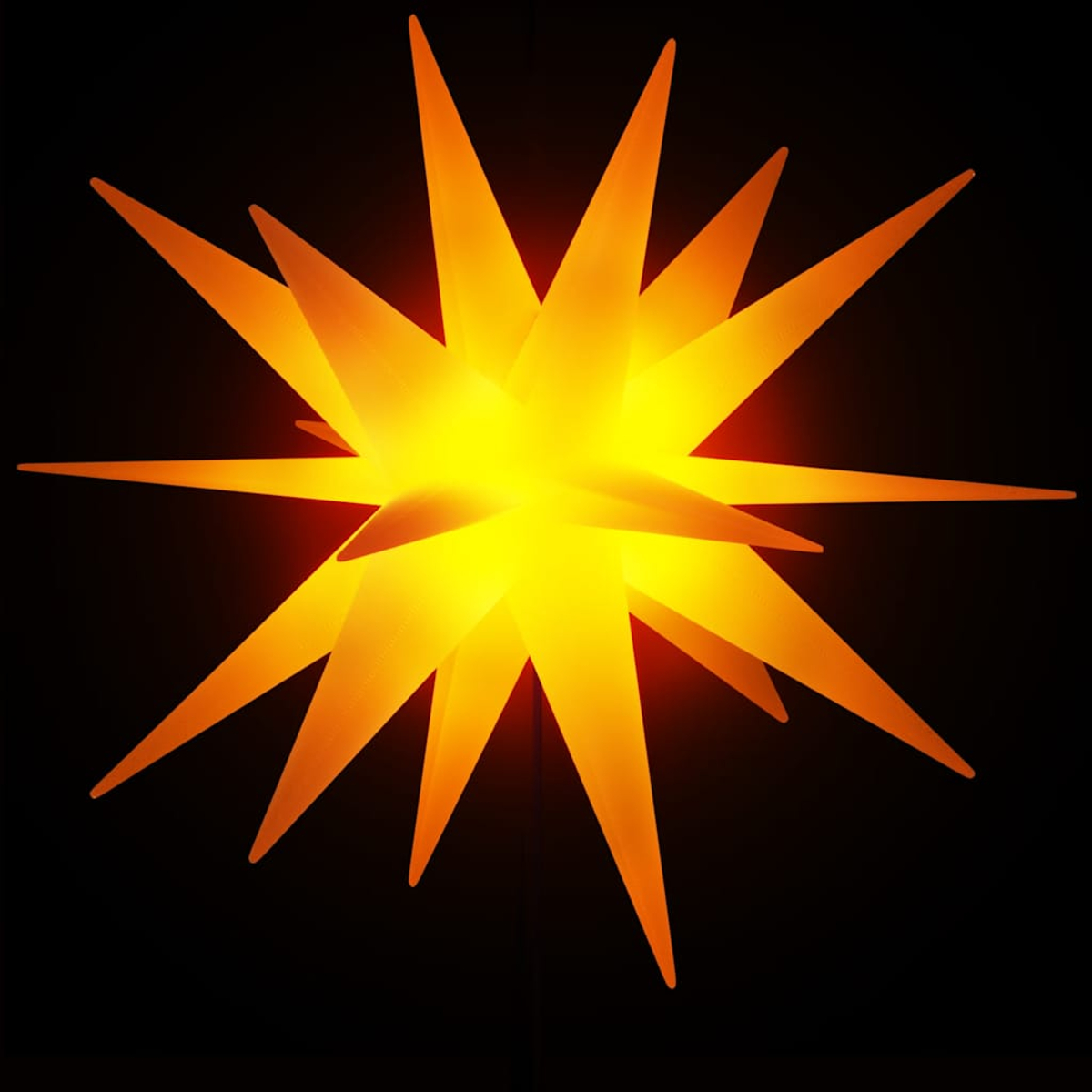 Ein leuchtender orangefarbener Stern auf schwarzem Hintergrund. Der Stern hat mehrere Spitzen und ein hellgelbes Zentrum.