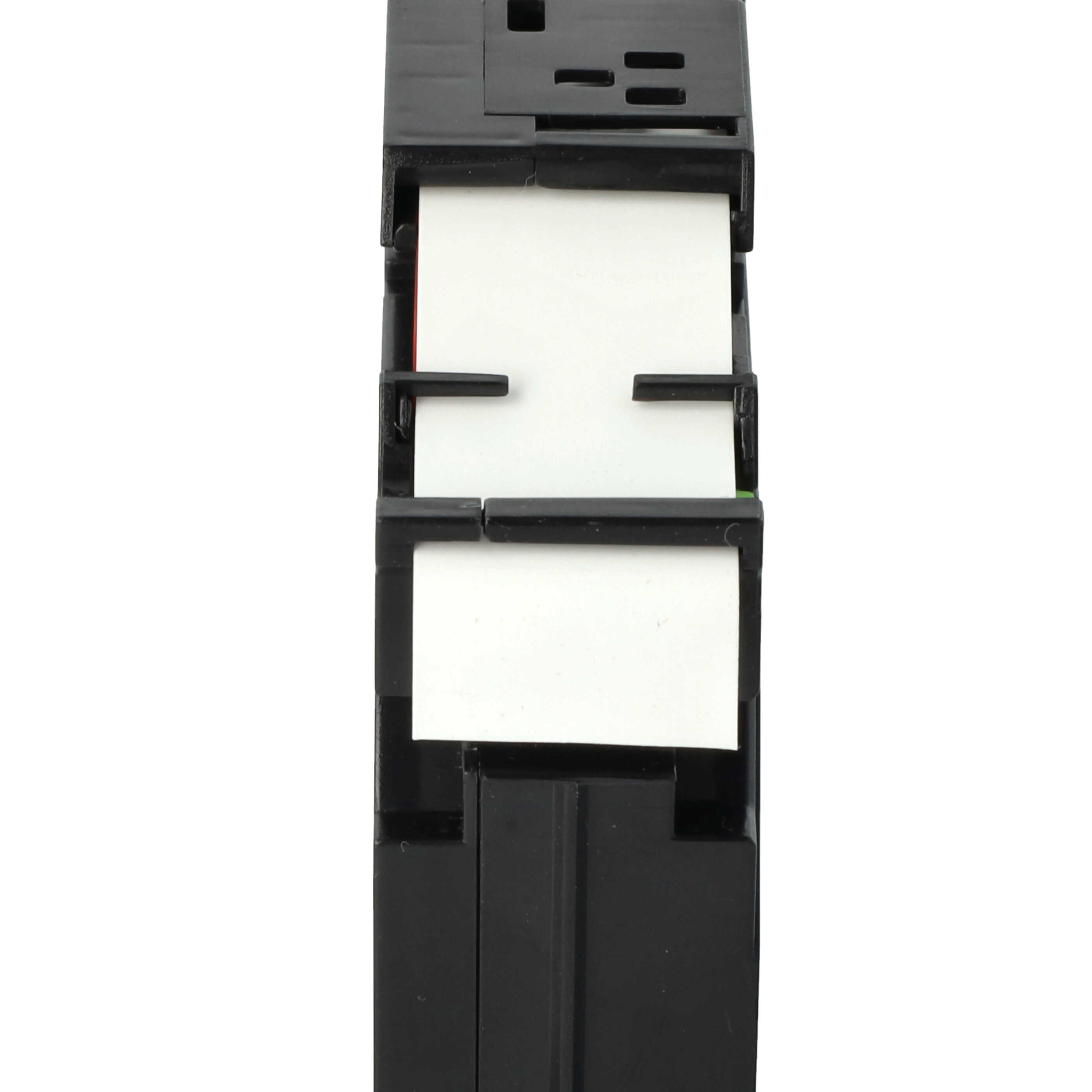 Ein schwarzes elektronisches Bauteil mit weißen und roten Elementen. Es hat rechteckige Schlitze und einen weißen Hintergrund.