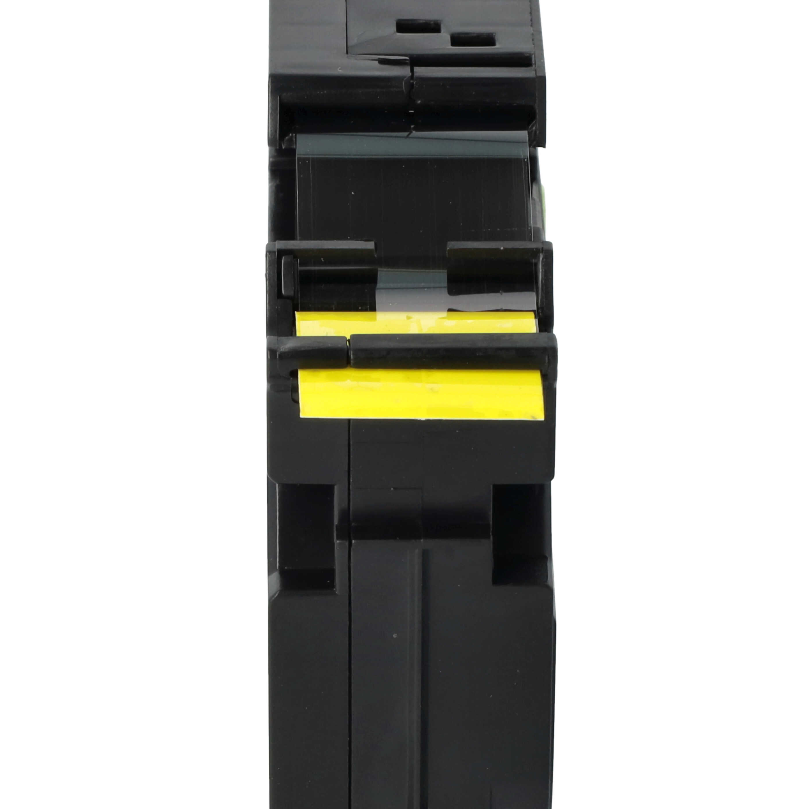 Ein schwarzes elektrisches Bauteil mit gelbem Streifen. Das Bauteil hat eine rechteckige Form mit mehreren Abschnitten und Schlitzen.