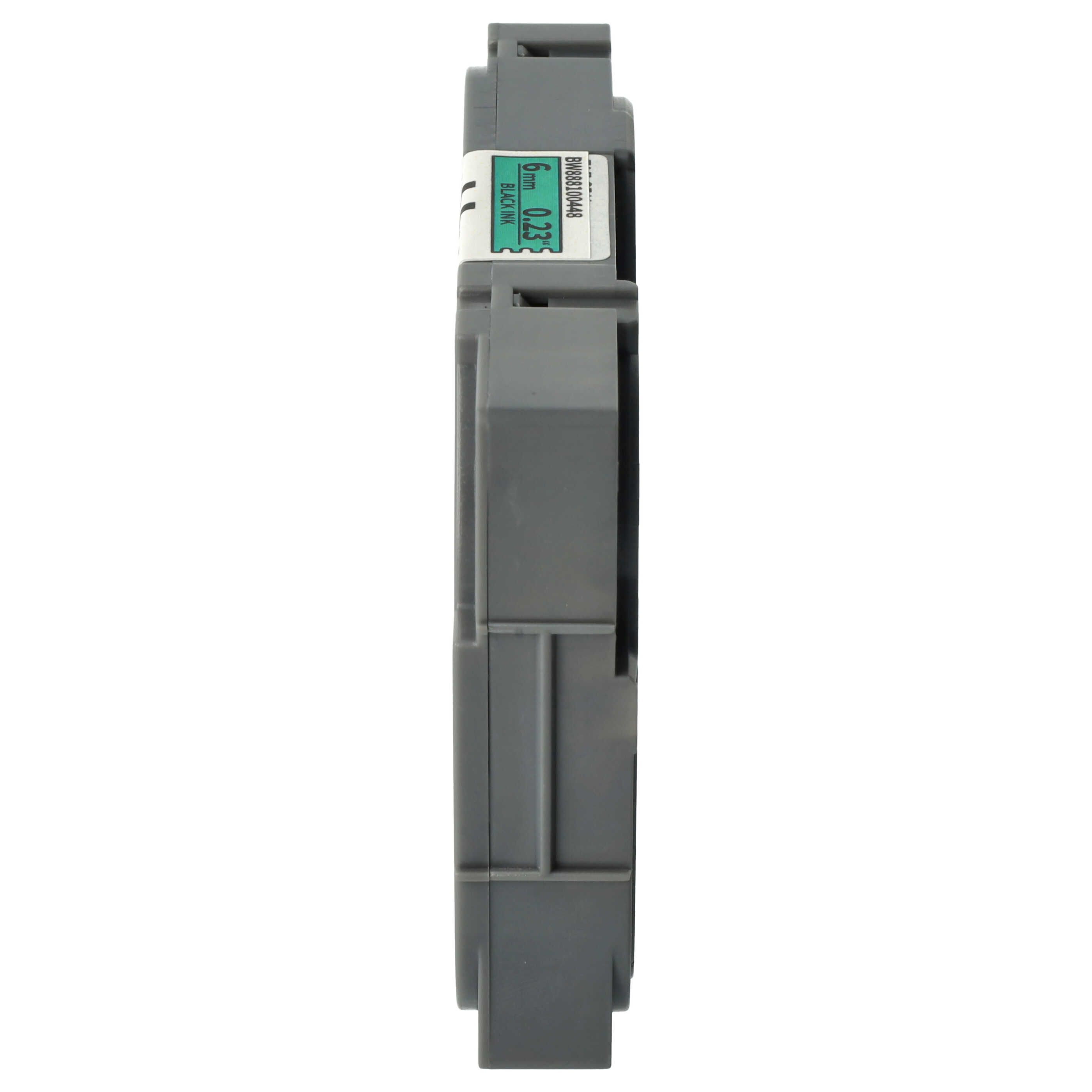 Ein graues rechteckiges elektronisches Bauteil mit einem Aufkleber mit Messungen und Informationen.