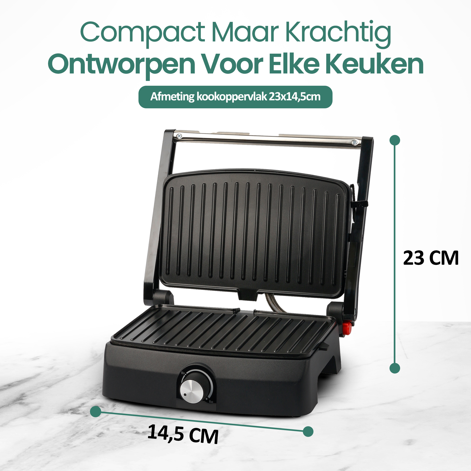 Ein schwarzer Panini-Grill mit Größenangaben. Der Text lautet: Compact Maar Krachtig. Für jede Küche konzipiert. Kochfläche 23x14,5 cm.