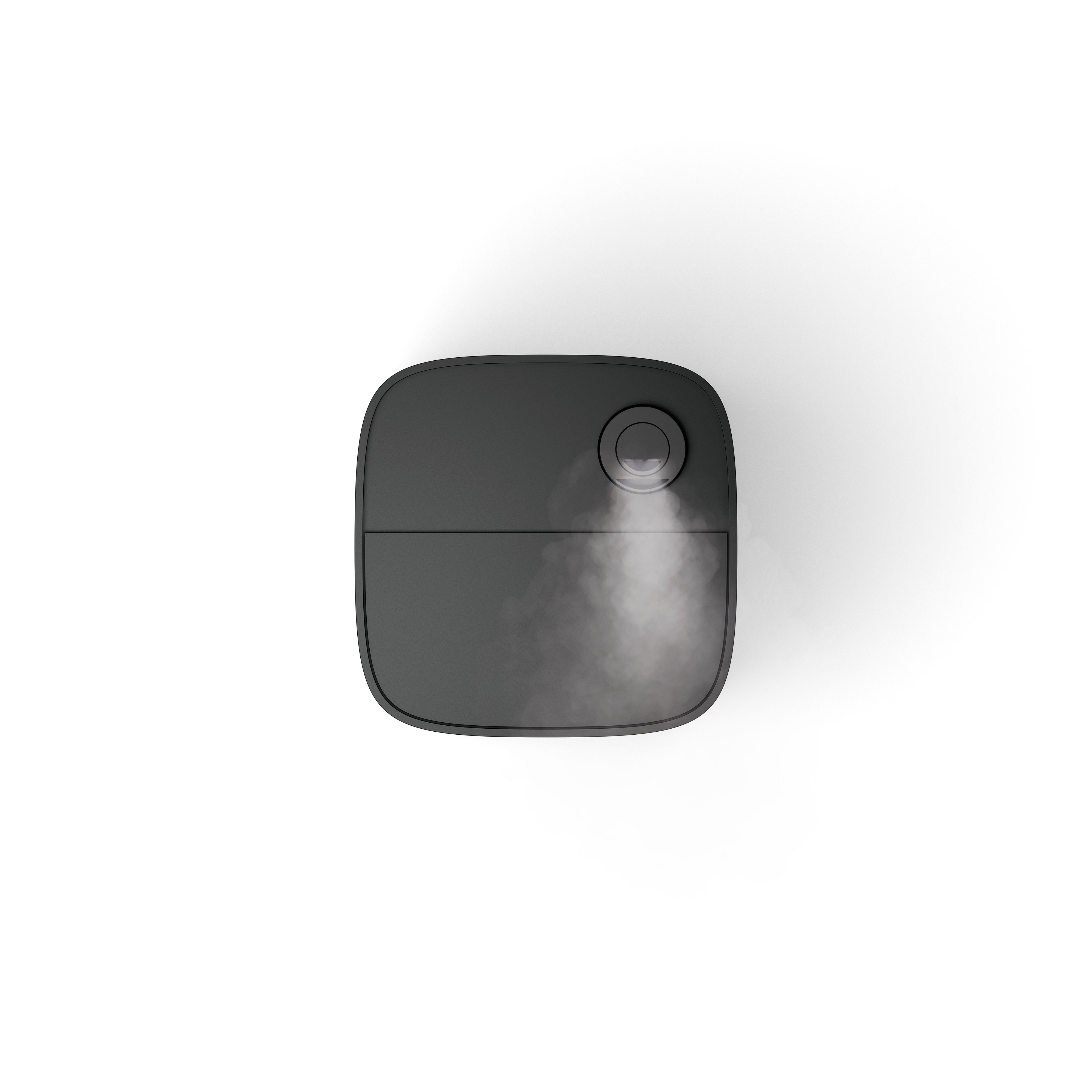 A black humidifier on a white background. Steam is emitting from the top of the device.