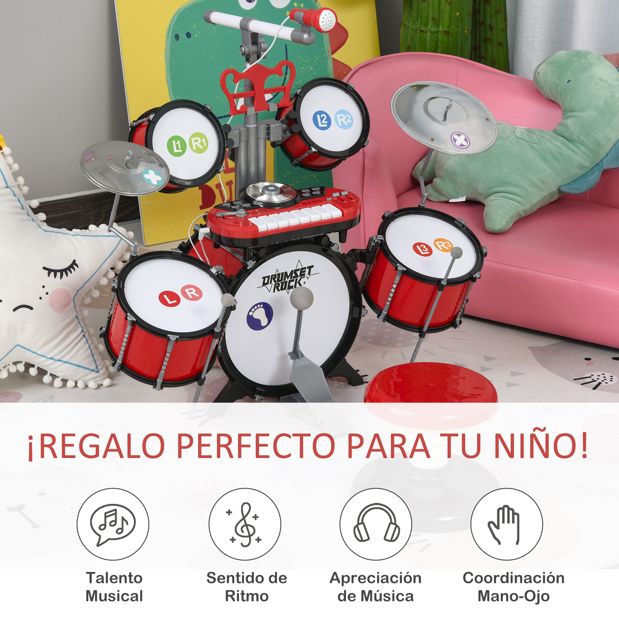 Un juego de batería para niños con tambores rojos, un teclado rojo y platillos. El fondo incluye una silla rosa y un peluche verde.