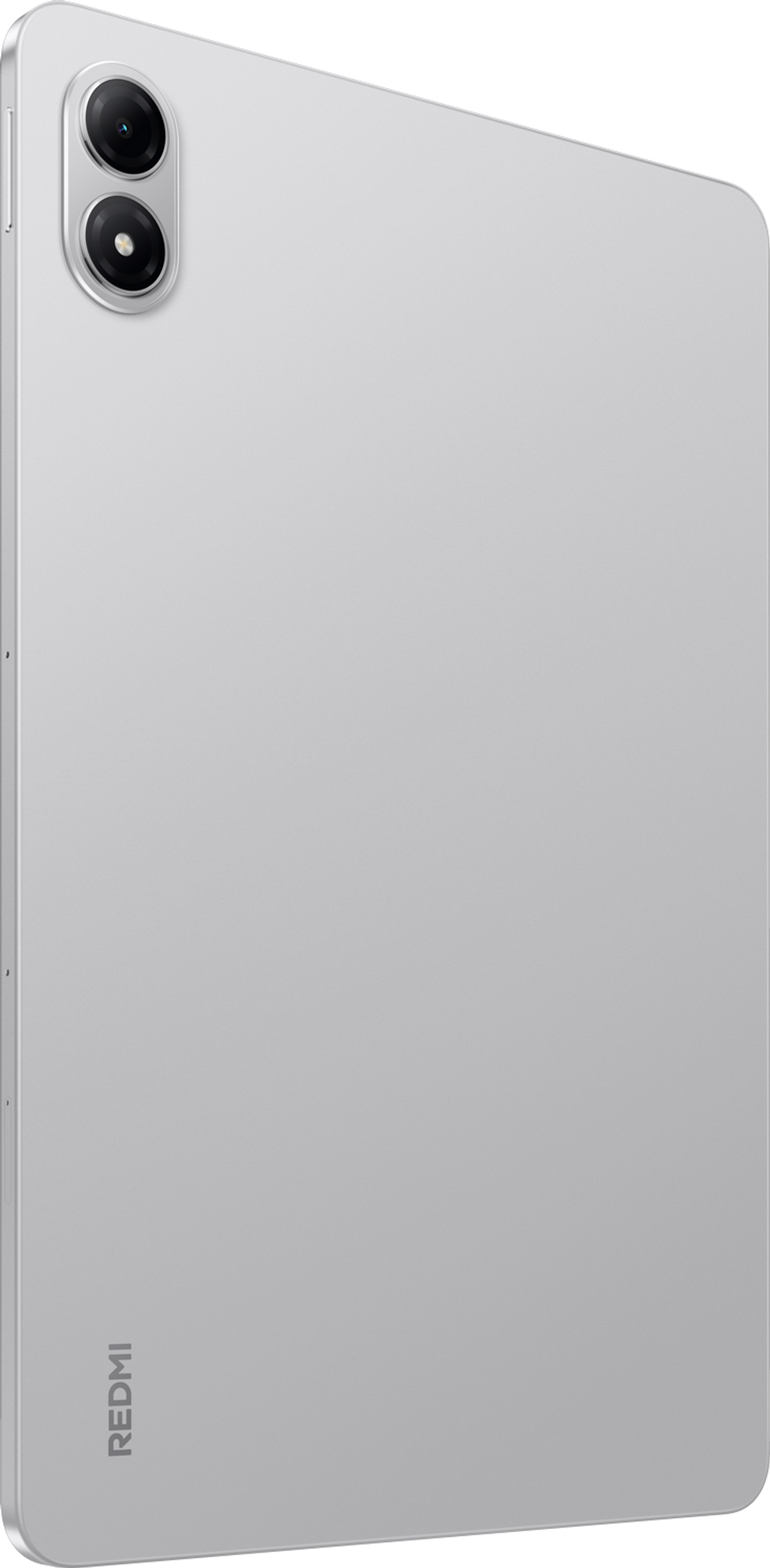 Srebrny tablet z podwójnym obiektywem aparatu po lewej stronie u góry. Widoczne logo Redmi. Tył gładki i szary.