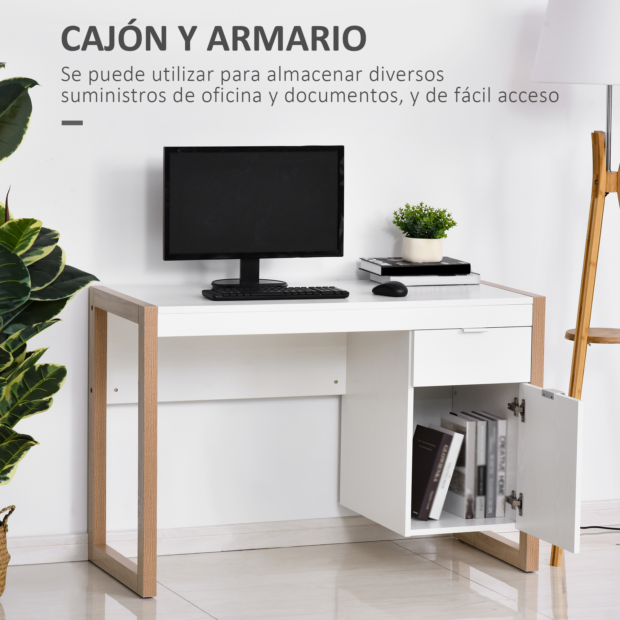 Escritorio blanco con computadora, teclado y ratón. Libros y una planta están en el escritorio. El armario tiene la puerta abierta con libros.