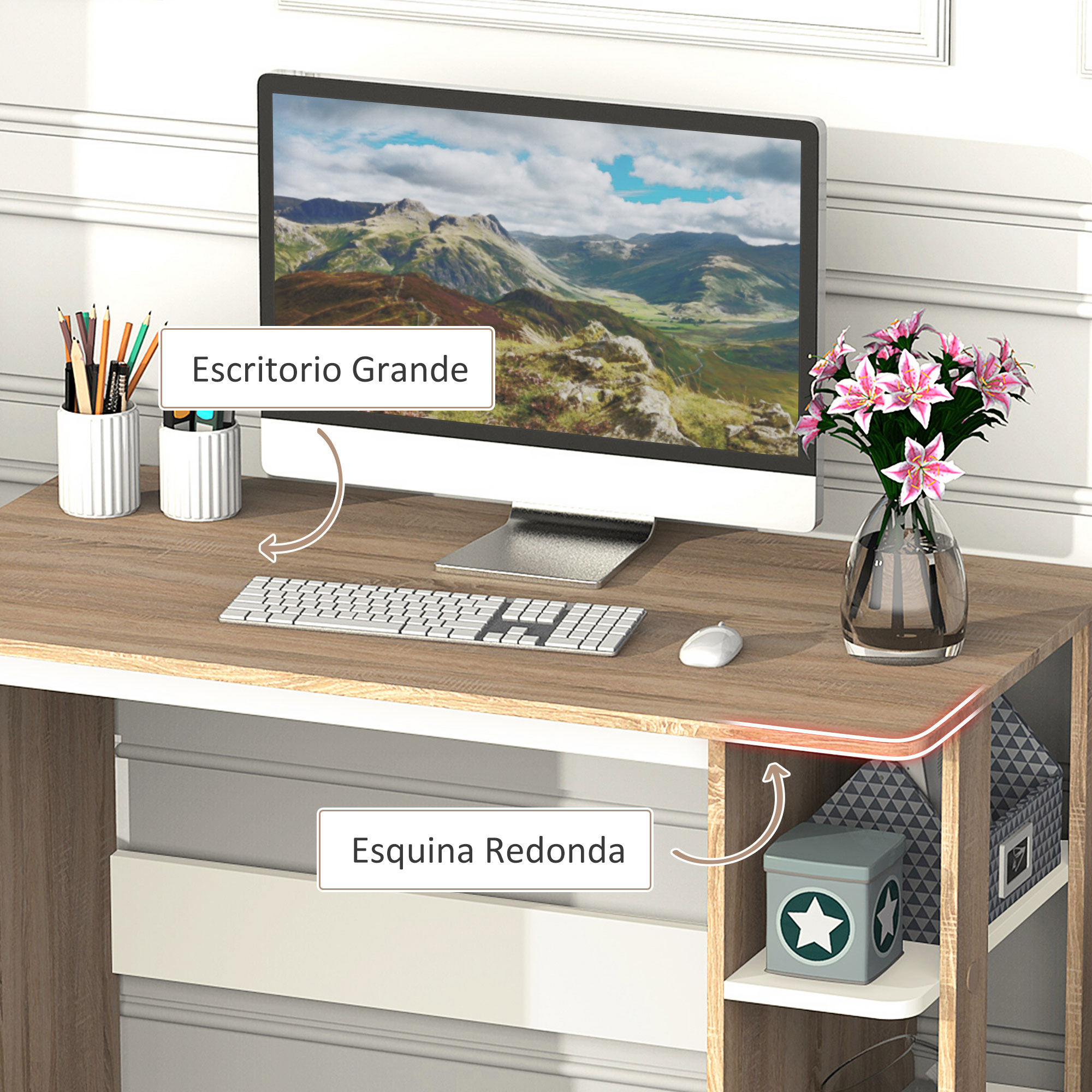 Un escritorio con monitor, teclado y flores. El escritorio tiene una tapa de madera y patas blancas. Una caja y libros en un estante.