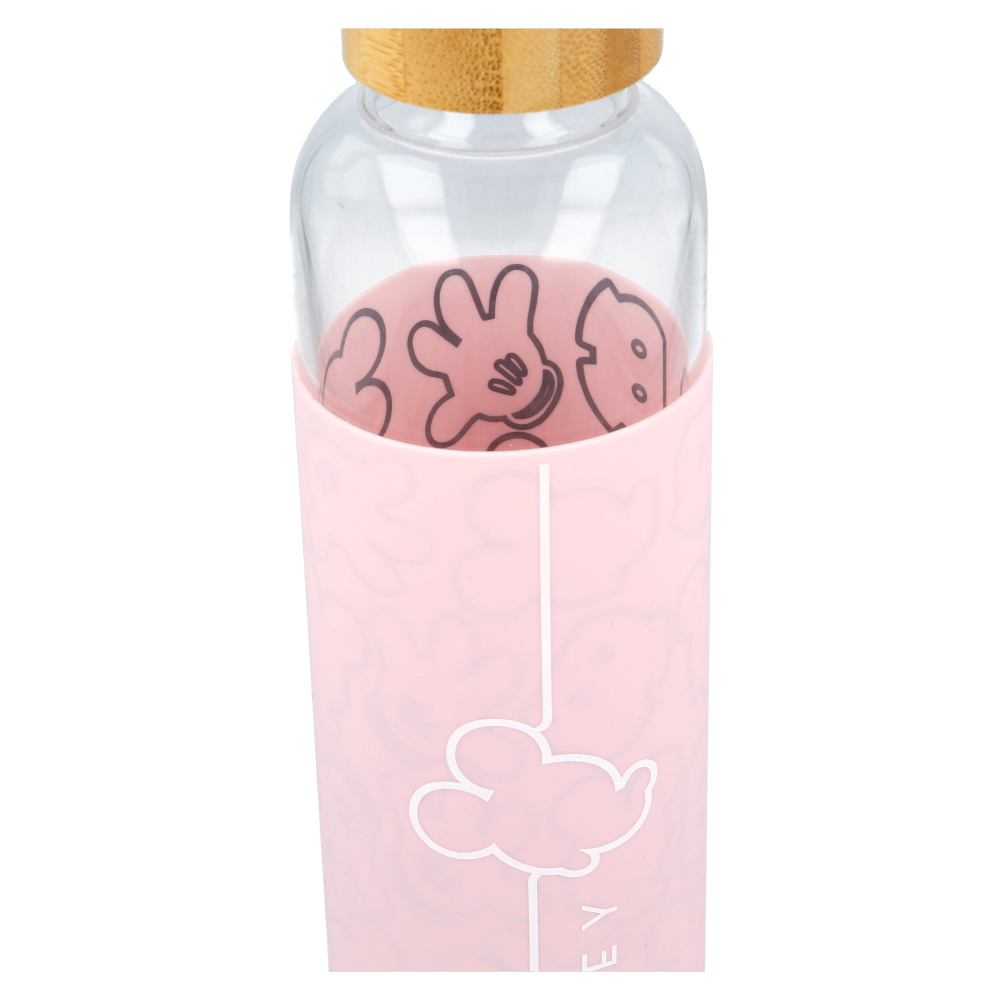 Una botella de agua rosa con tapa de madera. Tiene manos de Mickey Mouse y nubes. La botella es de vidrio transparente.