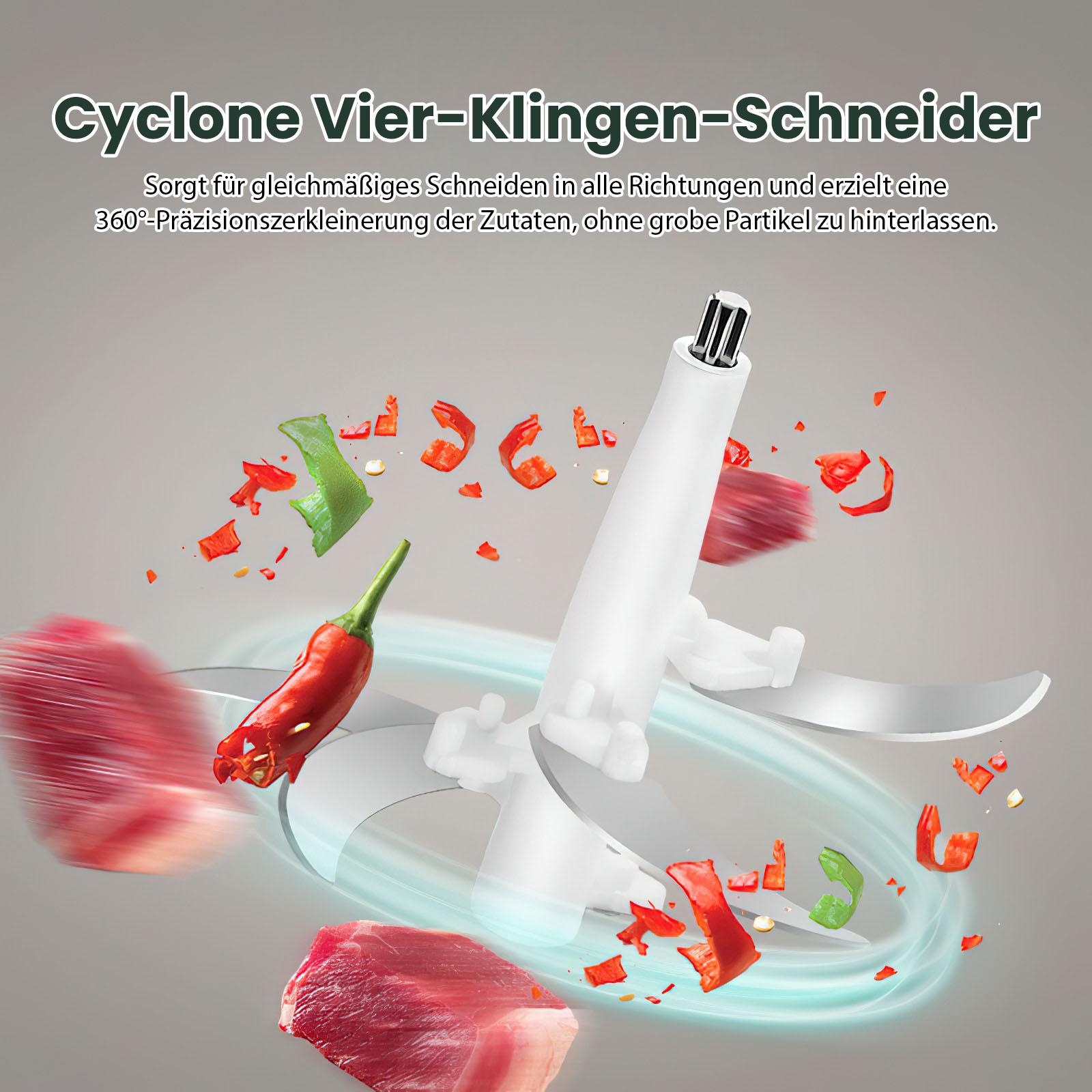 Ein weißer Foodprocessor mit Klingen zerkleinert Gemüse und Fleisch. Rote, grüne und weiße Farben sind sichtbar.