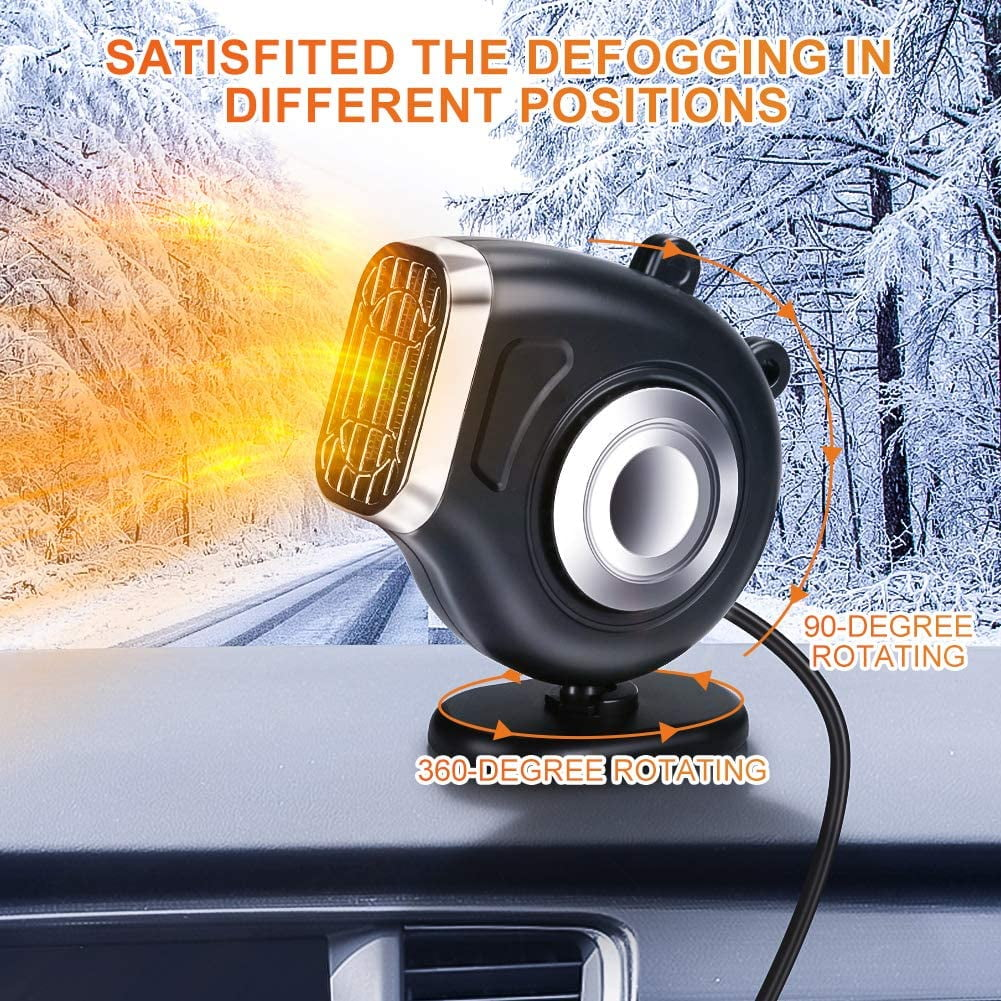 Ein schwarzer Auto-Defogger auf einem Armaturenbrett, mit verschneitem Hintergrund. Er kann sich um 360 Grad und 90 Grad drehen. Der Defogger ist an.