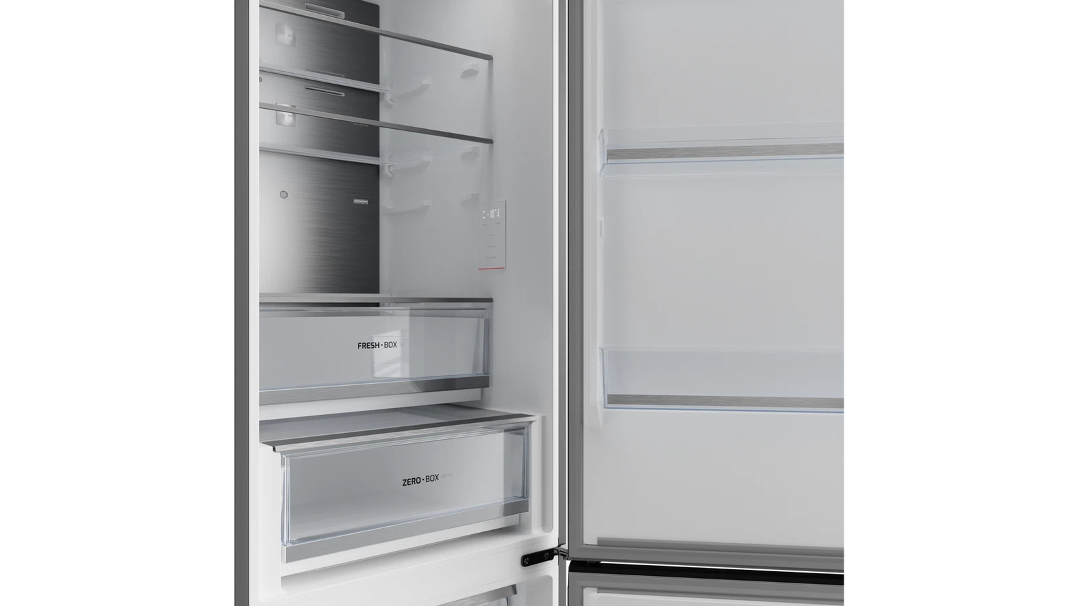 Un refrigerador abierto que muestra estantes, cajones y compartimentos. Las etiquetas dicen FRESH BOX y ZERO BOX.