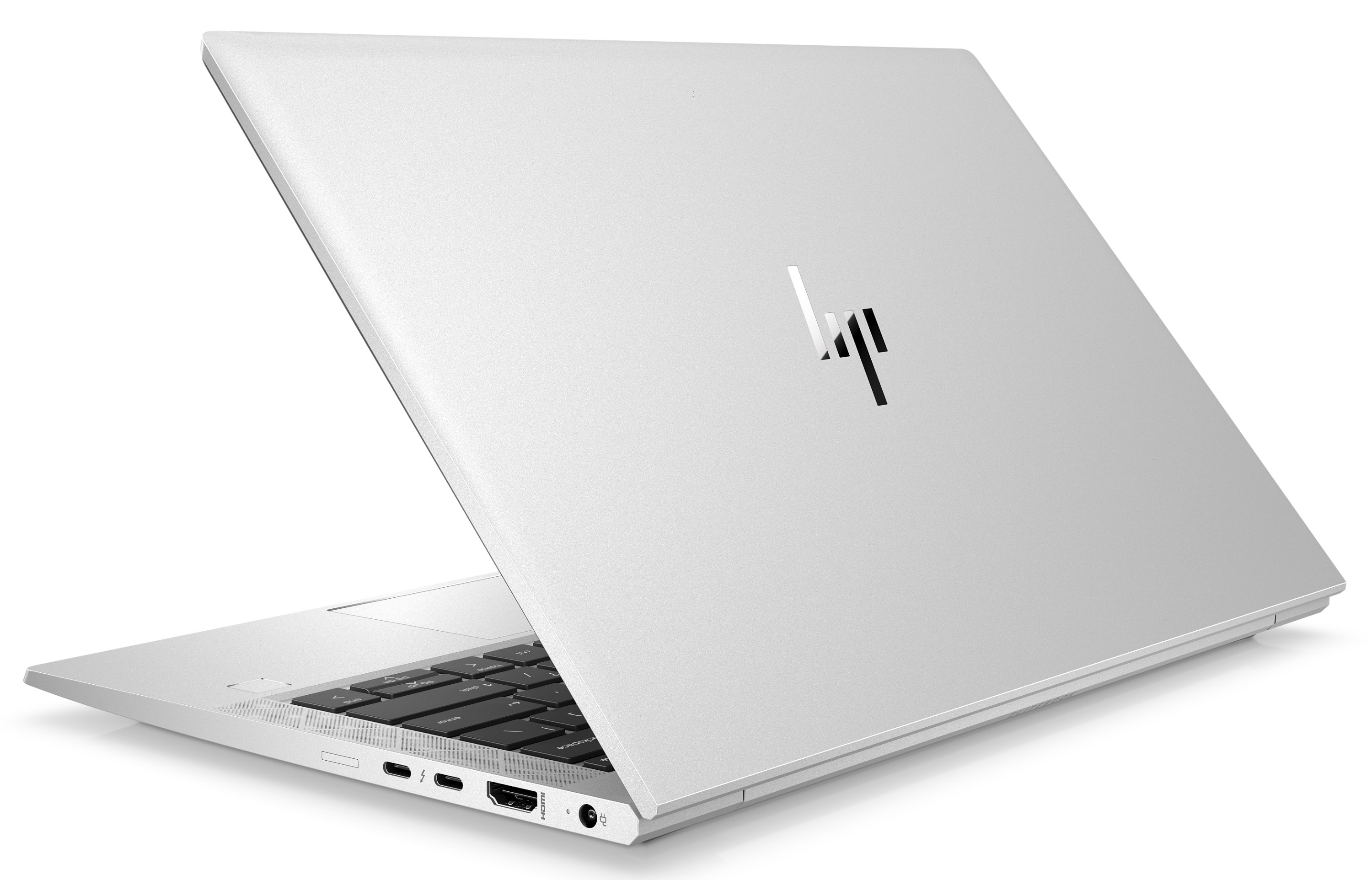 Ein silberner HP-Laptop ist geöffnet und zeigt Tastatur und Anschlüsse. Das HP-Logo ist sichtbar.