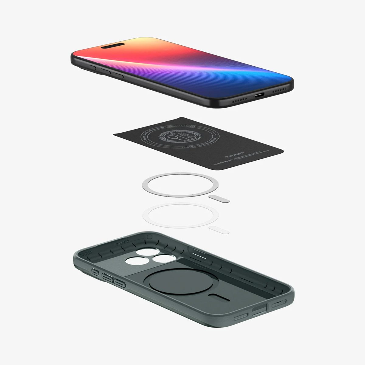 Een explosie view van een telefoon en accessoires. Boven de telefoon, gevolgd door een zwarte kaart, twee ringen en een grijze hoes.