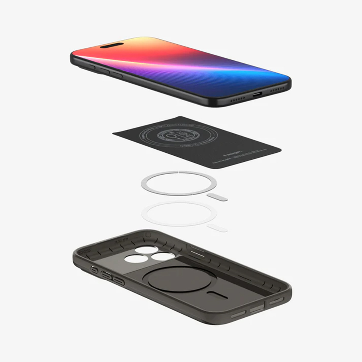 Vue éclatée d'un téléphone, d'un étui et d'accessoires. L'écran du téléphone affiche des dégradés colorés. L'étui est gris foncé.