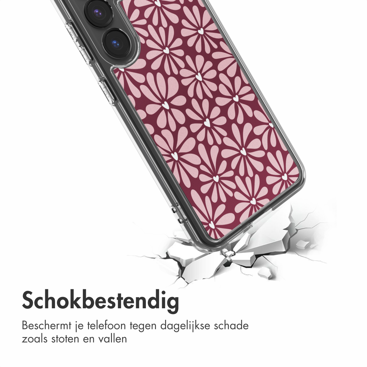 Telefoonhoesje met bloemenpatroon, rustend op een gebarsten oppervlak. De hoes heeft een transparant frame.