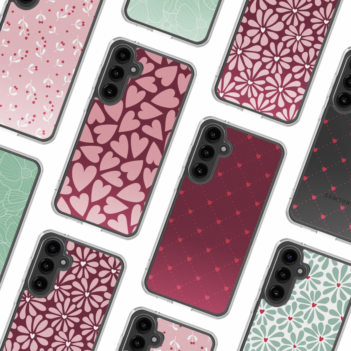 Meerdere telefoonhoesjes met verschillende patronen zoals harten en bloemen in roze en rood. De hoesjes staan op een witte achtergrond.