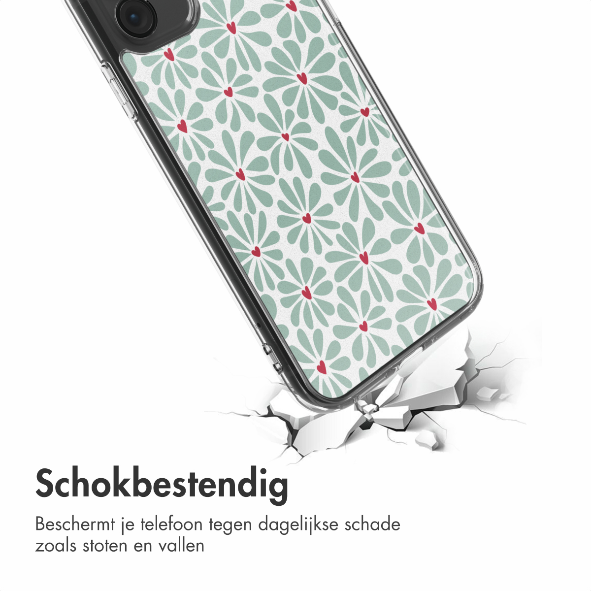 Una custodia per telefono con un design floreale, che cade su una superficie incrinata. La custodia ha un motivo di foglie verdi e cuori rossi.