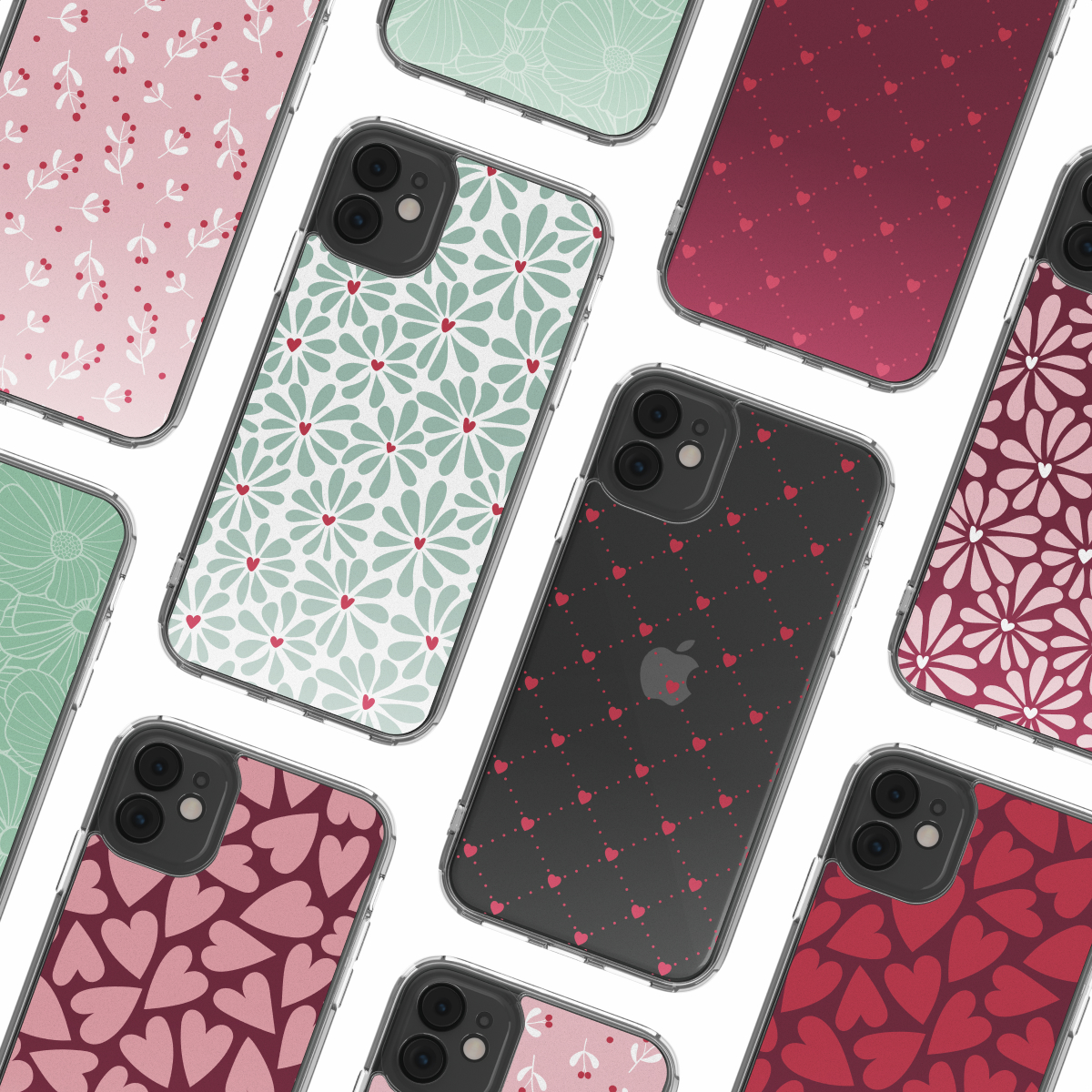 Diverse custodie per telefono con vari motivi: floreali, cuori e pois nei colori rosa, rosso e verde. Sono mostrate custodie in plastica trasparente.