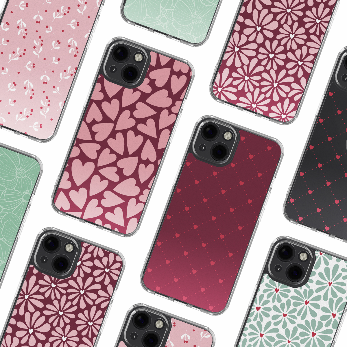 Collezione di custodie per iPhone con vari motivi: cuori, fiori, pois e foglie nei colori rosa, rosso e verde. Le custodie sono disposte su sfondo bianco.
