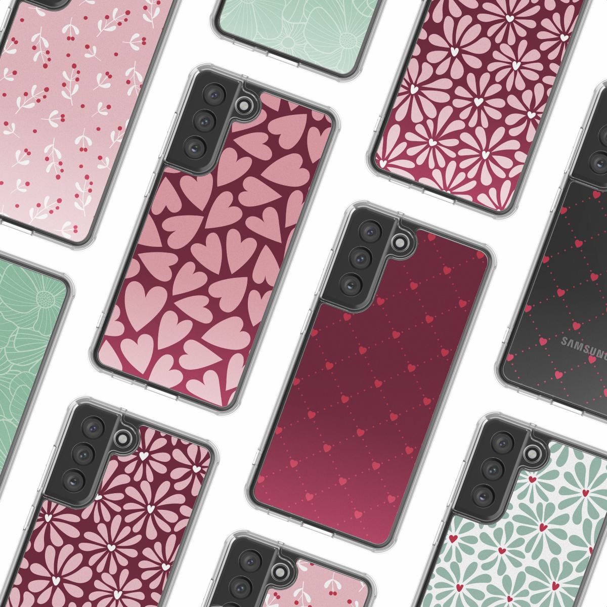 Varie custodie per telefoni con diversi disegni: cuori, fiori e pois. Le custodie sono nei colori rosa, rosso e verde, disposte su una superficie bianca.