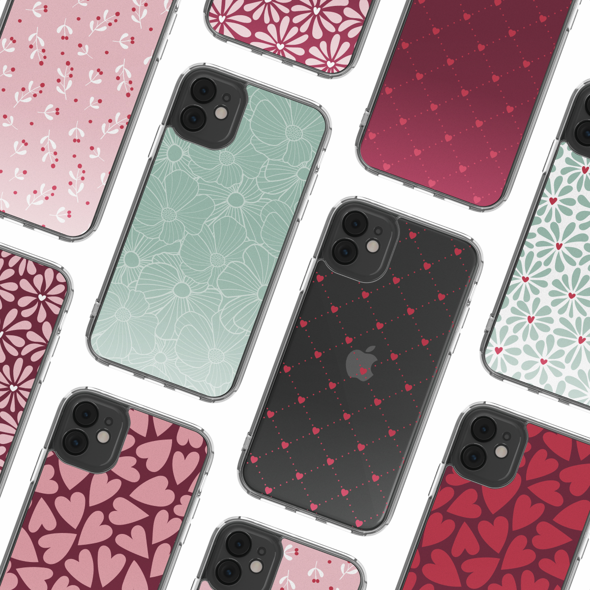 Molteplici custodie per iPhone con vari motivi: floreali, cuori e design a pois in rosa, rosso e verde, disposte su sfondo bianco.
