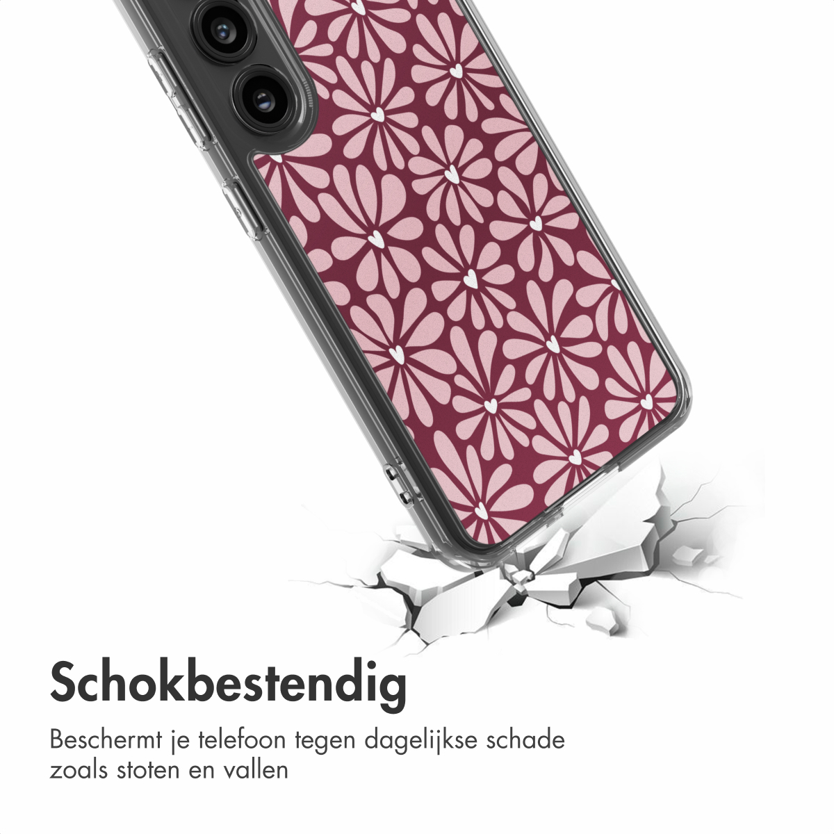 Telefoonhoesje met roze bloemenpatroon, op gebarsten wit oppervlak. Tekst 'Schokbestendig' eronder.