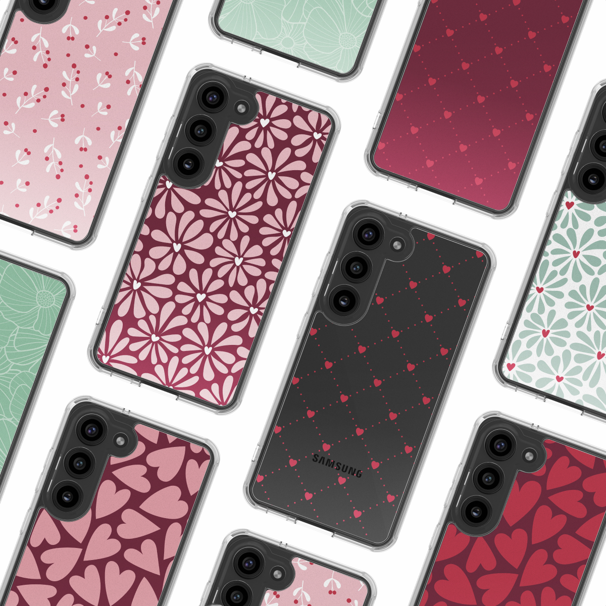 Verschillende smartphonehoesjes met bloemen-, hart- en bladerpatronen in roze, rood en groen op een witte achtergrond.