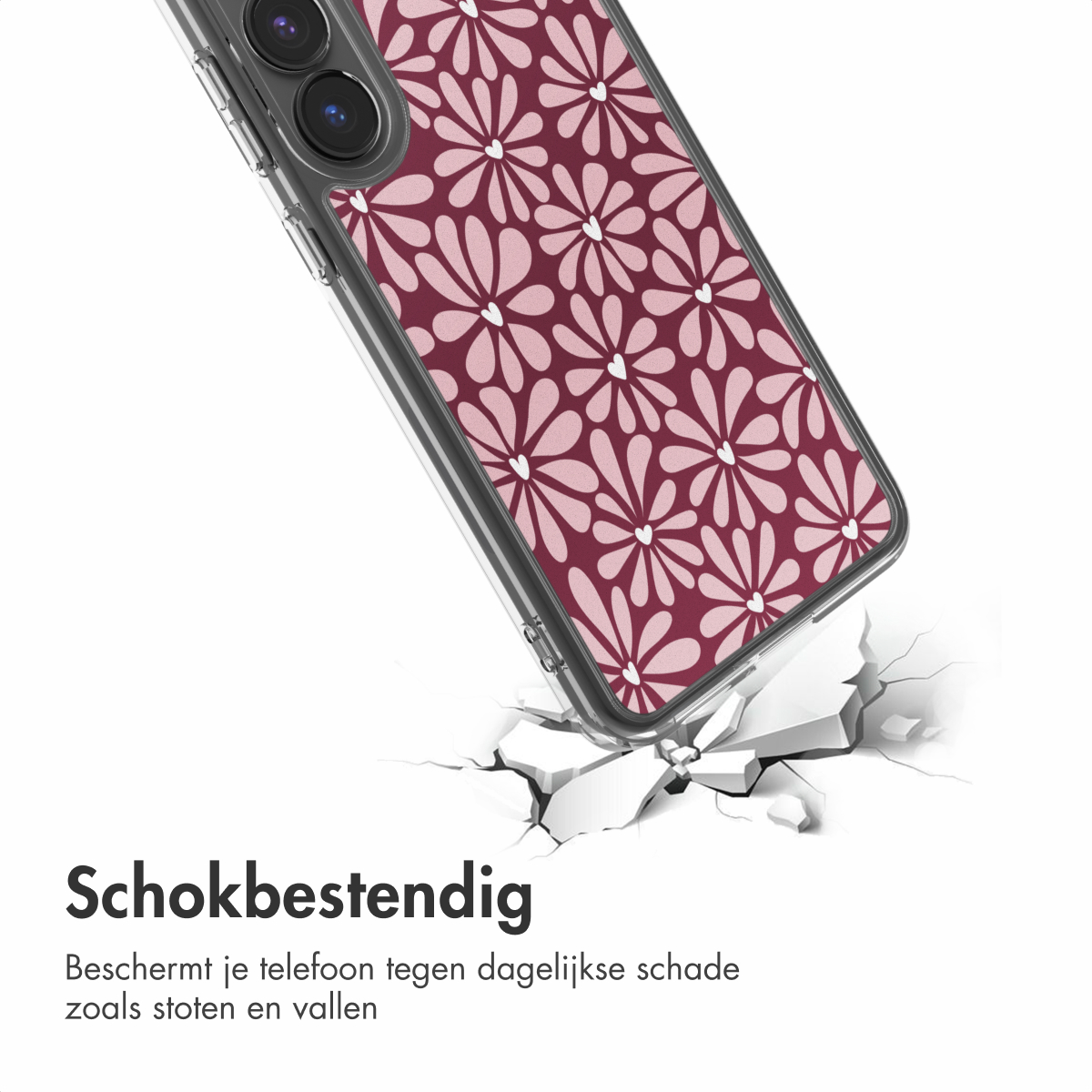 Transparante telefoonhoes met bordeauxrood bloemmotief, die een wit oppervlak breekt. Tekst: 'Schokbestendig', voor bescherming.