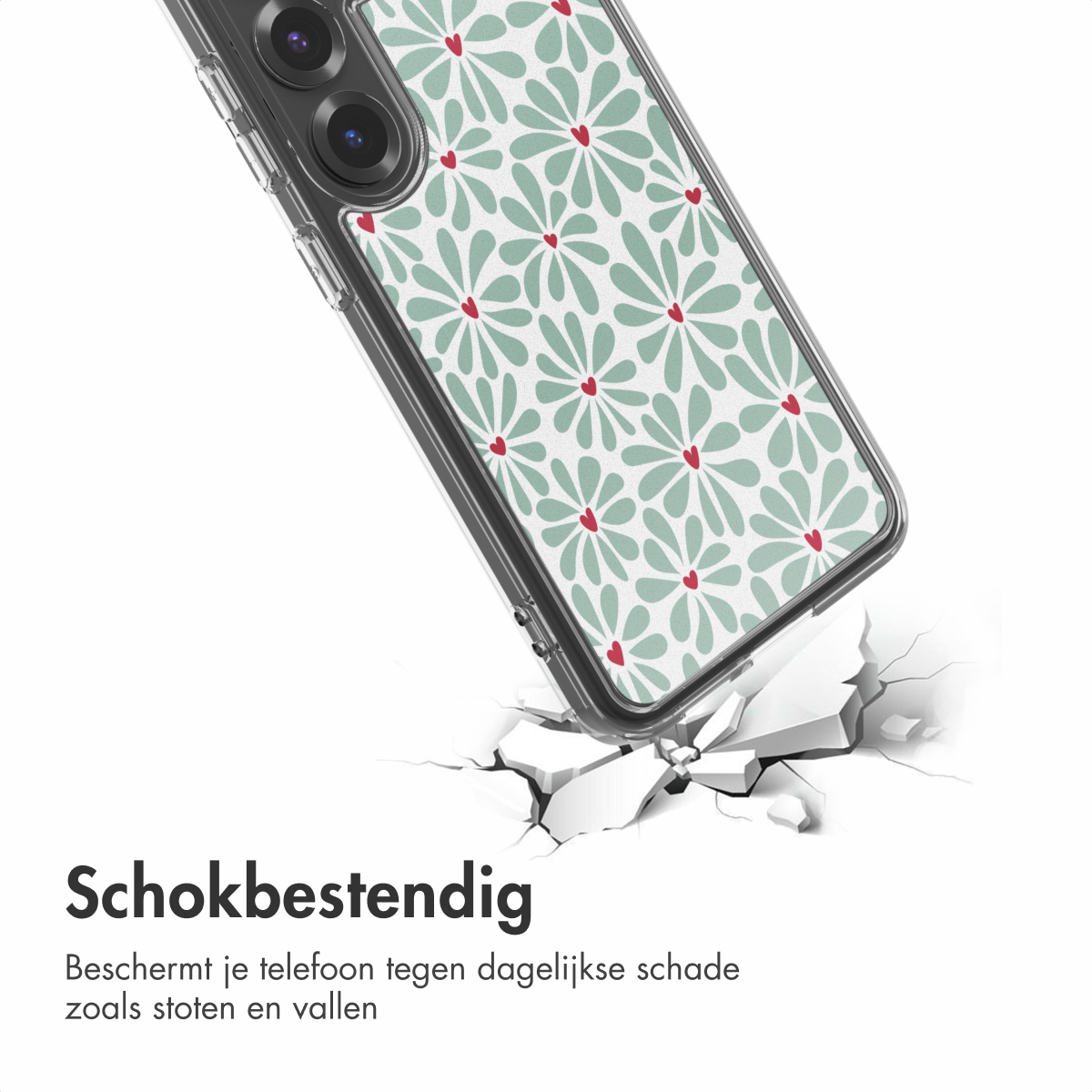 Een telefoonhoesje met een bloemenpatroon breekt een oppervlak. De hoes heeft groene bloemen met rode harten en is transparant.