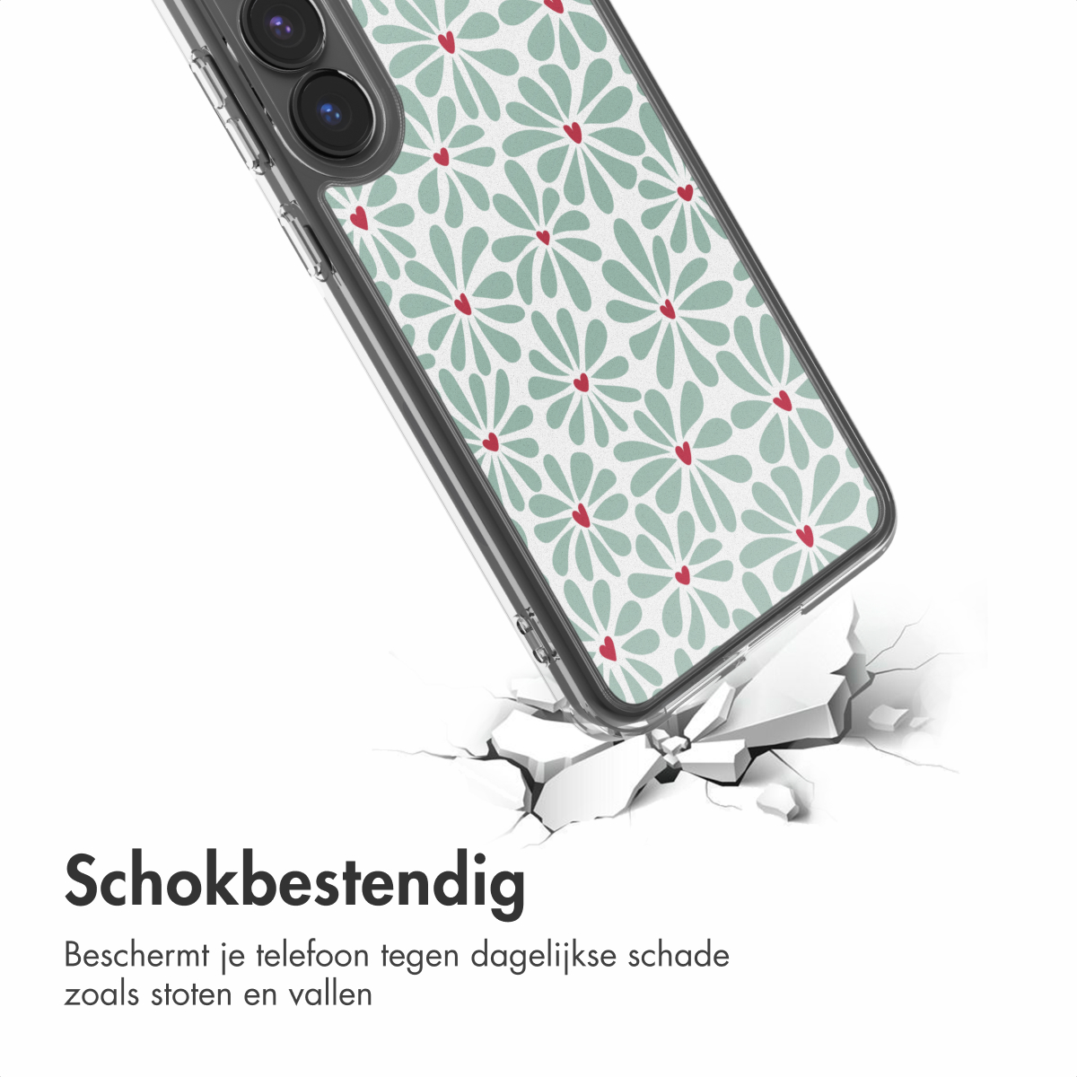 Een telefoonhoesje met een bloemenpatroon breekt een wit oppervlak. De hoes heeft een doorzichtig frame en is naar beneden gekanteld.