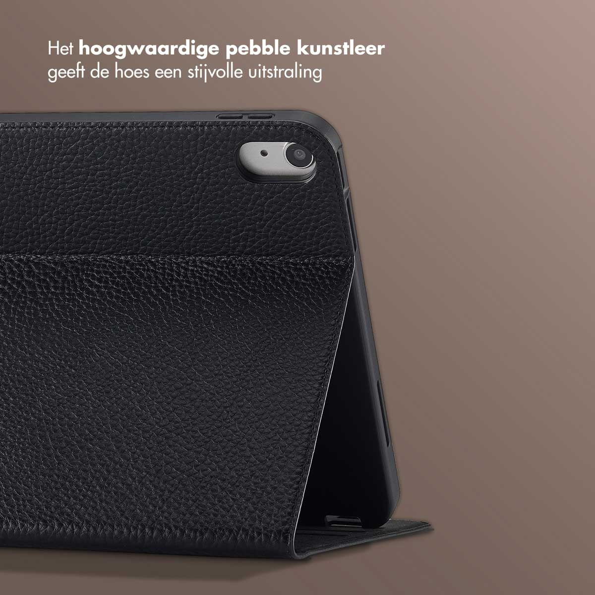 Black leather case for a tablet, close-up. The case is open, showing the camera. Background is brown.