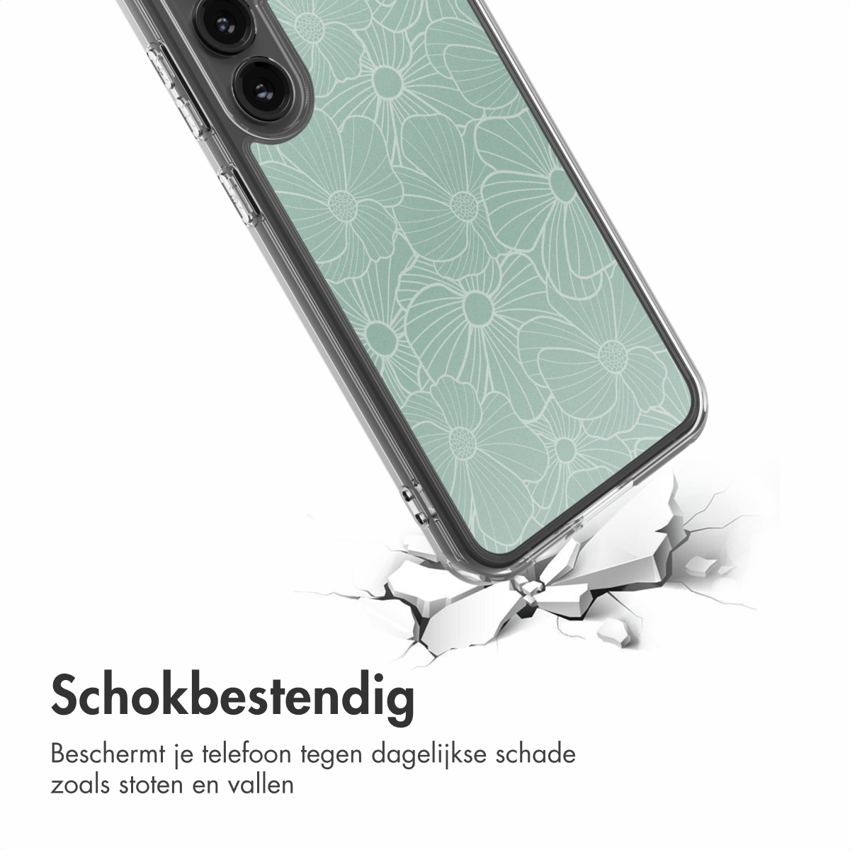 Una custodia per telefono con un motivo floreale sta rompendo una superficie. La custodia è trasparente con un design floreale verde. Il testo dice 'Antishock'.