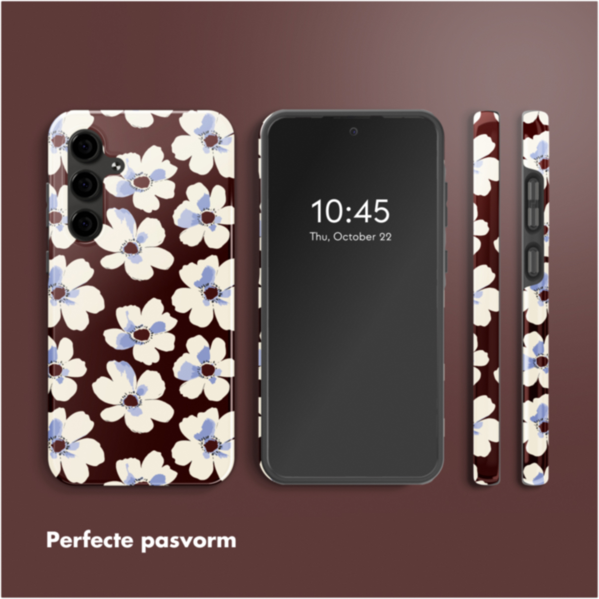 Téléphone avec coque florale. L'écran affiche l'heure et la date. Des coques assorties sont à côté du téléphone. Fond marron.