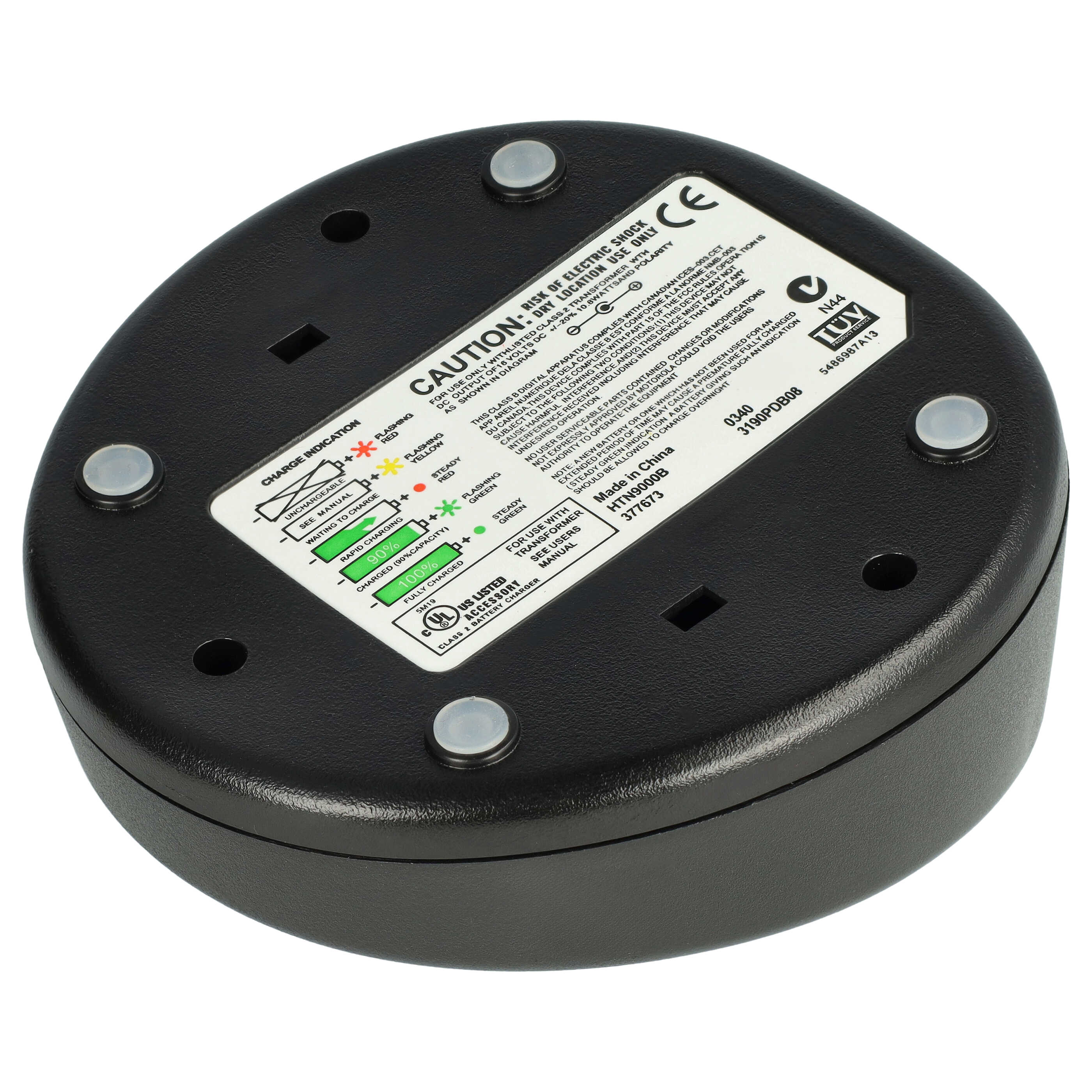 Schwarze Batterieladegerätbasis mit Etikett, das Ladezustandsanzeigen und Sicherheitshinweise zeigt.
