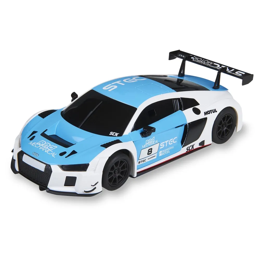 Un coche de carreras de juguete azul y blanco con ruedas negras y un alerón trasero, etiquetado con 'STEC' y 'Rnd Mechanical'.