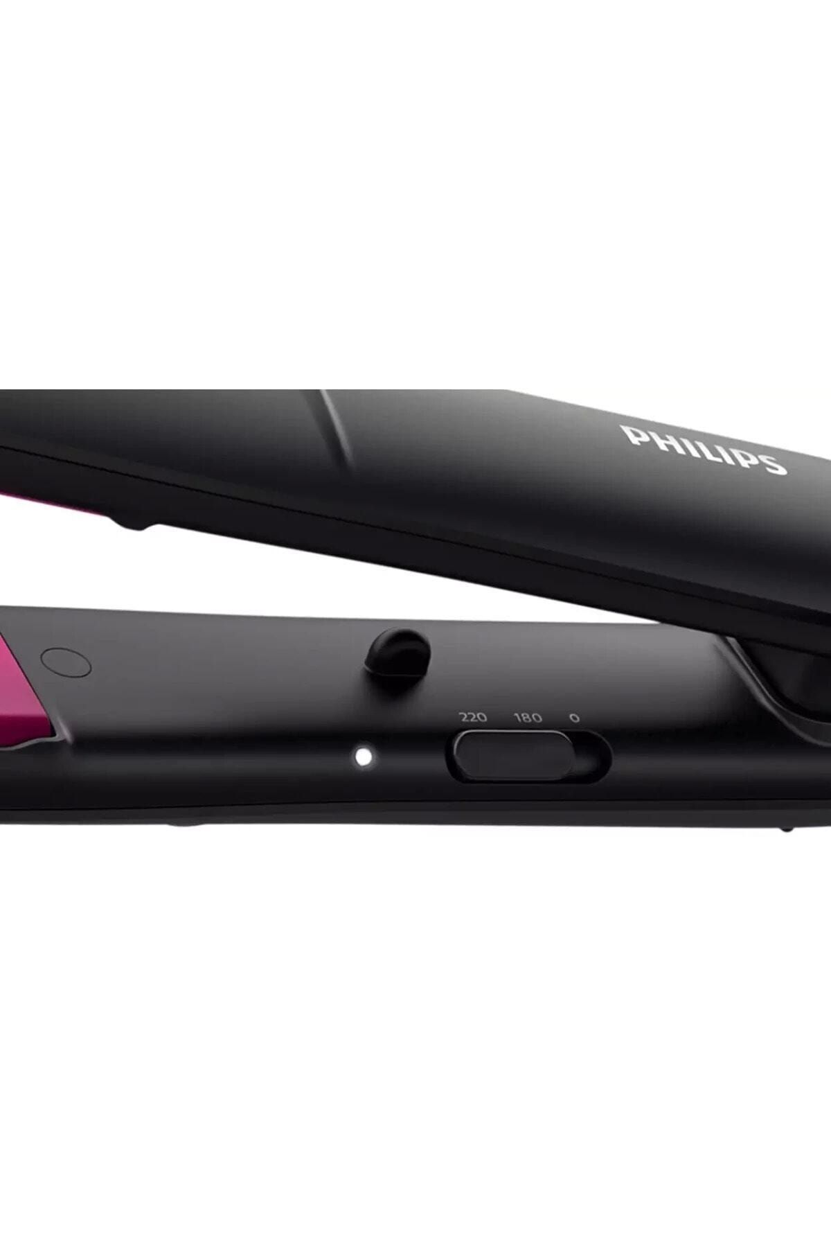 Czarna prostownica Philips, białe światło, ustawienia temperatury 180 i 220. Różowe wnętrze i czarny wygląd.