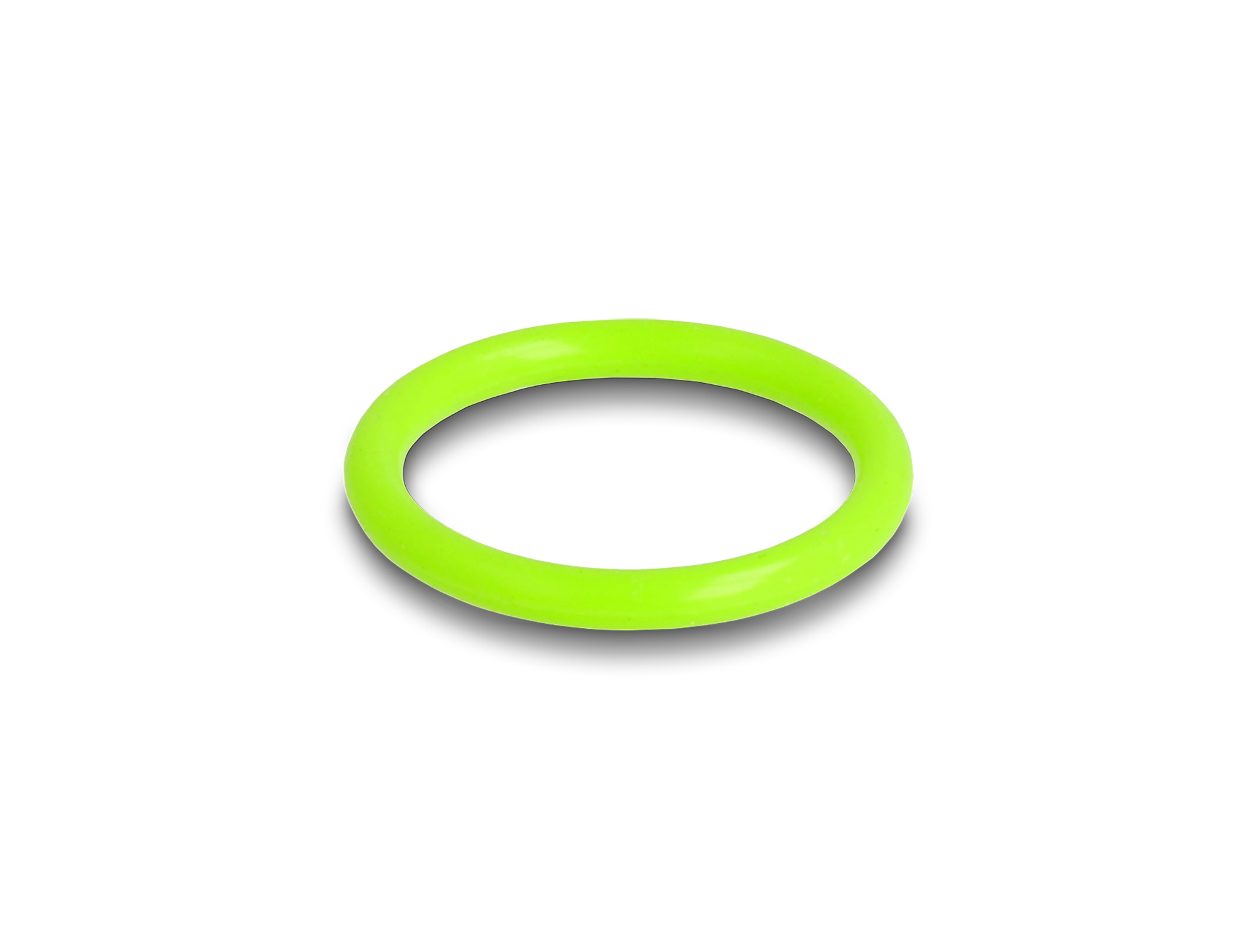 Un anello verde brillante, circolare, è appoggiato su una superficie bianca. L'anello proietta un'ombra sottile.