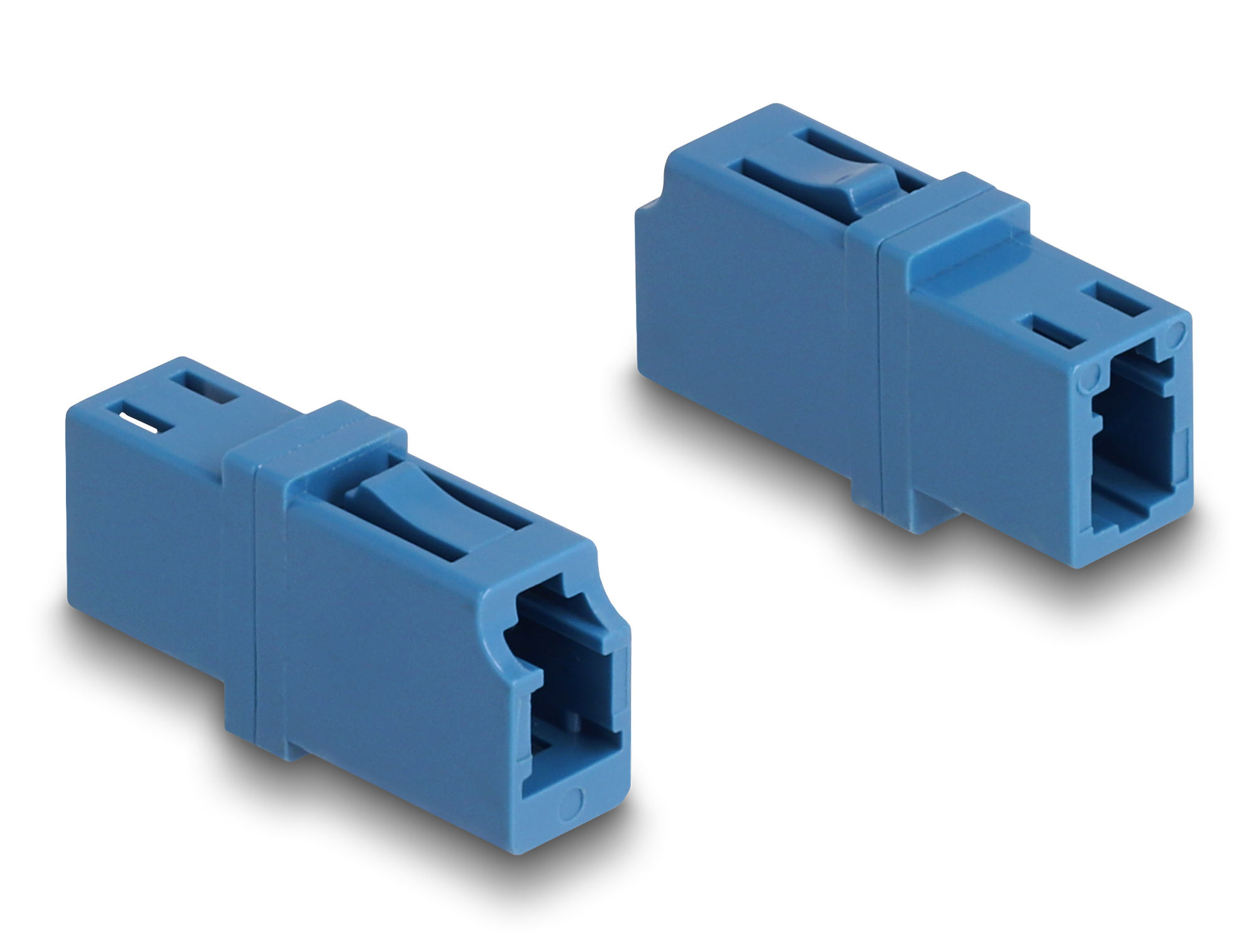 Due connettori in plastica blu di forma rettangolare, inclinati su sfondo bianco, con ombre.
