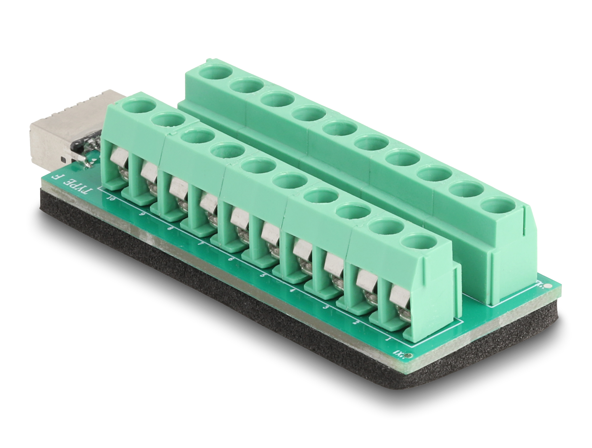 Un morsetto verde con molteplici punti di connessione si trova su un circuito stampato verde con base in schiuma nera e connettore argentato.