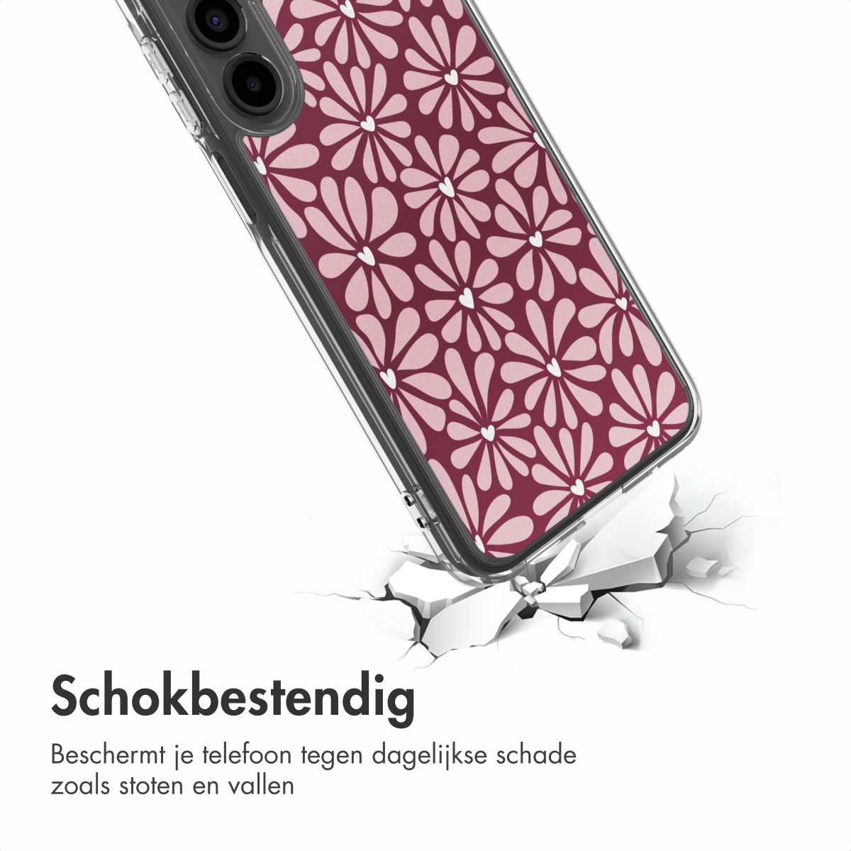 Telefoon met bloemenhoesje valt op een gebarsten oppervlak. De hoes heeft bordeauxrode bloemen en een transparante rand. Achtergrond is wit.