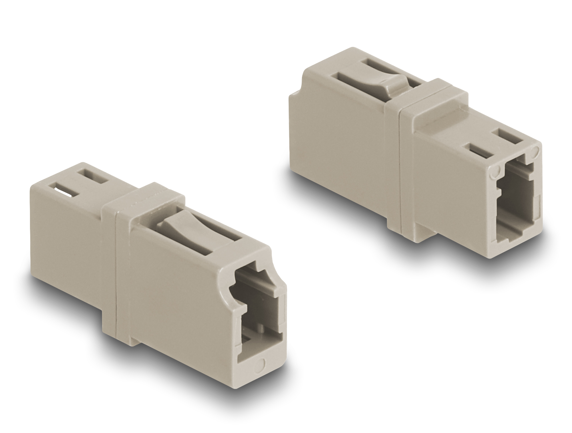 Due connettori RJ45 beige su sfondo bianco. Ognuno ha un fermo e un'apertura rettangolare per un cavo.