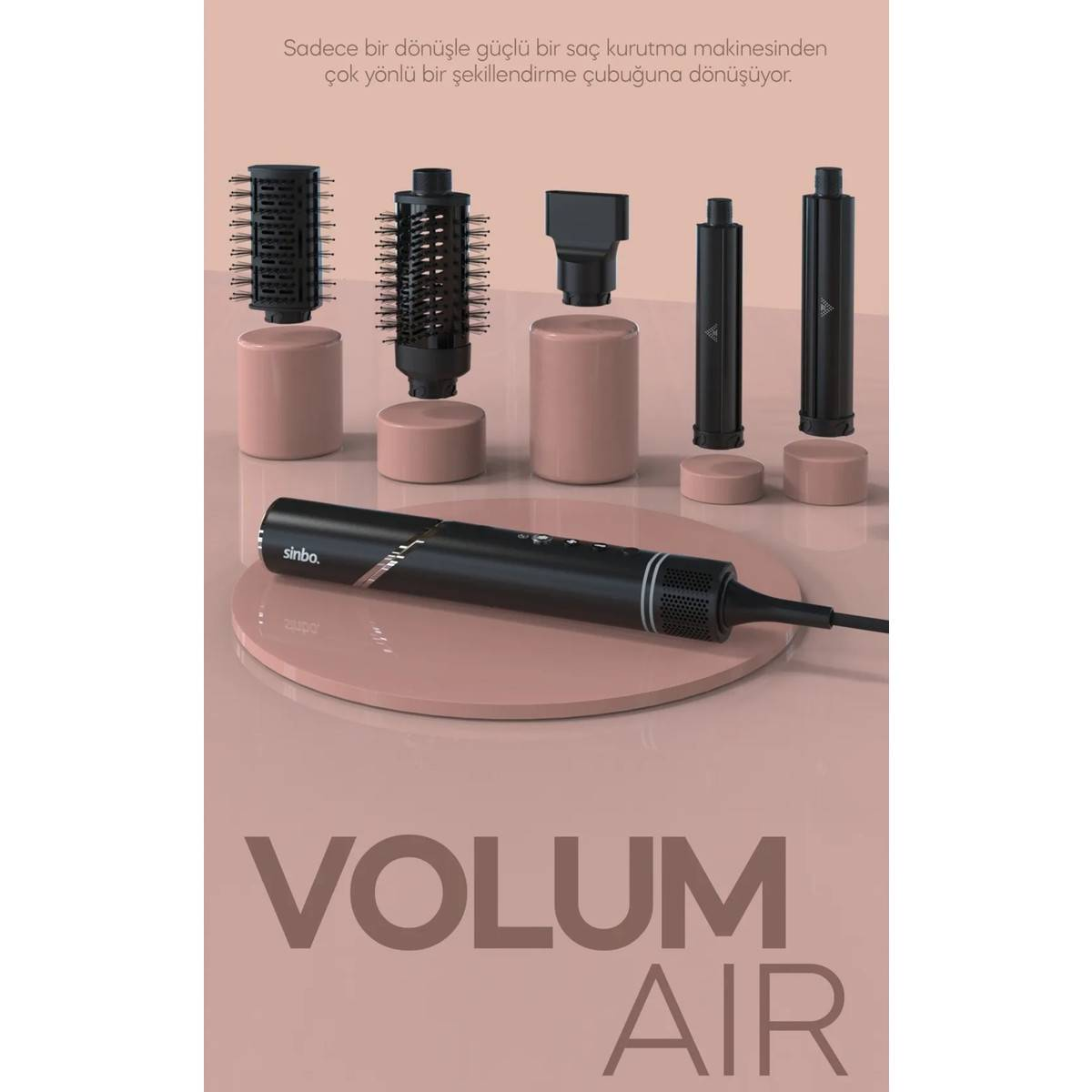 Pembe yüzeyde çoklu başlıkları olan saç şekillendirme cihazı, 'Volum Air' etiketli. Türkçe metin içerir.
