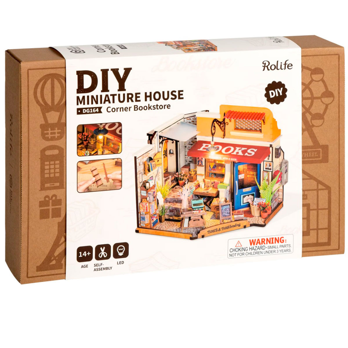 Zestaw do samodzielnego montażu miniaturowego domu w pudełku. Przedstawia księgarnię z czerwonym markizą, książkami i detalami wnętrz. Brązowe pudełko.