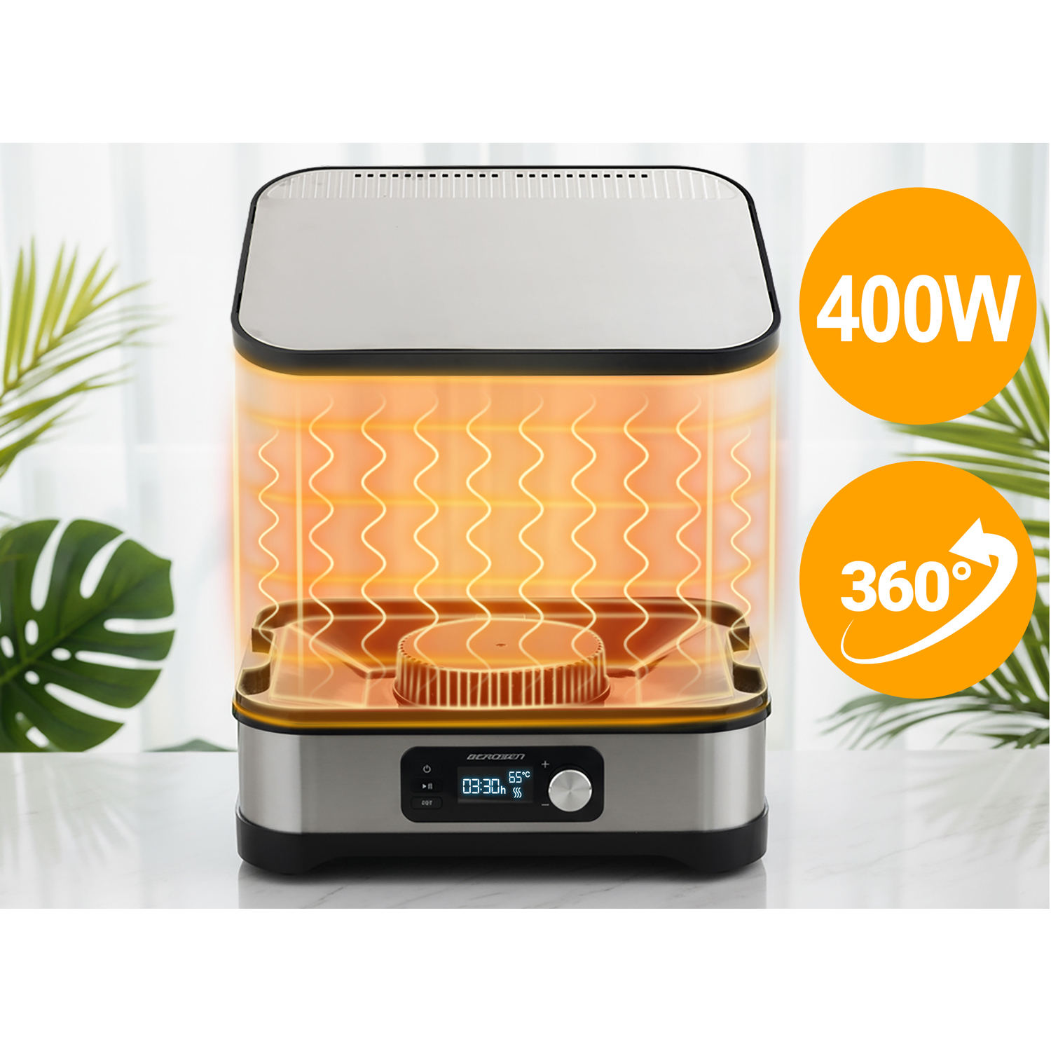 Elektryczny piekarnik blatu, z widocznymi elementami grzewczymi. Posiada wyświetlacz cyfrowy i dwa pomarańczowe okręgi z białym tekstem.