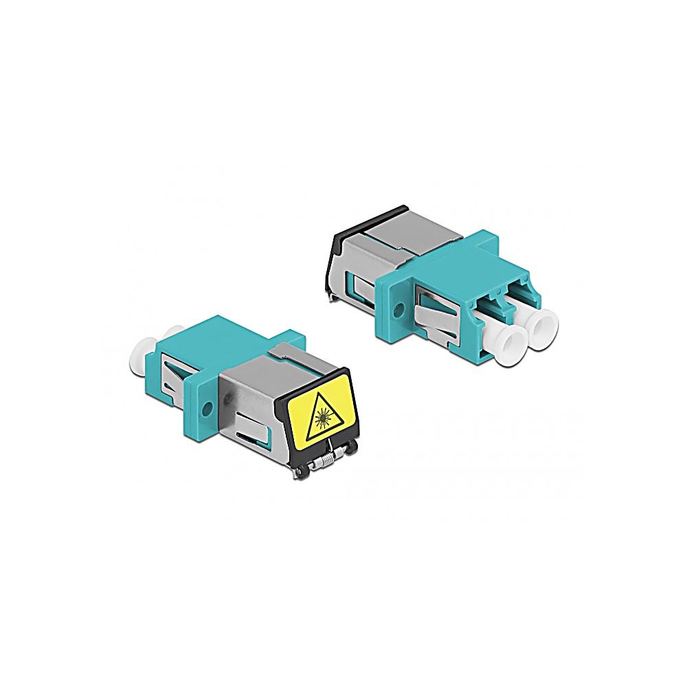 Due connettori in fibra ottica con alloggiamenti color turchese e parti metalliche argentate, un'etichetta di pericolo gialla e estremità dei connettori bianche, isolati su bianco.