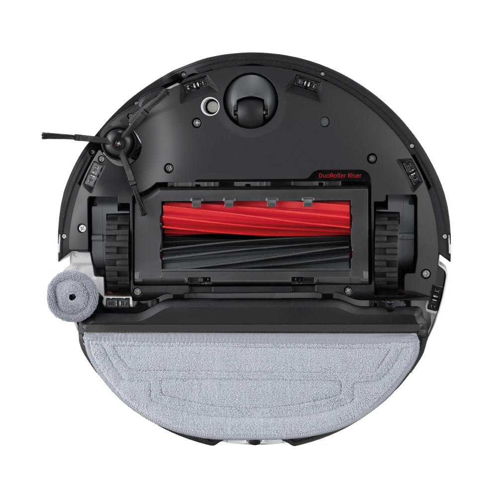 Widok z góry na czarno-szary odkurzacz automatyczny. Ma czerwoną i czarną szczotkę, szarą nakładkę czyszczącą i szczotkę boczną.