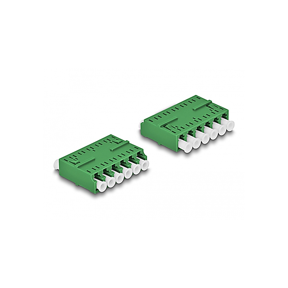 Due componenti elettronici rettangolari verdi con connettori cilindrici bianchi, su sfondo bianco. I componenti sono identici.